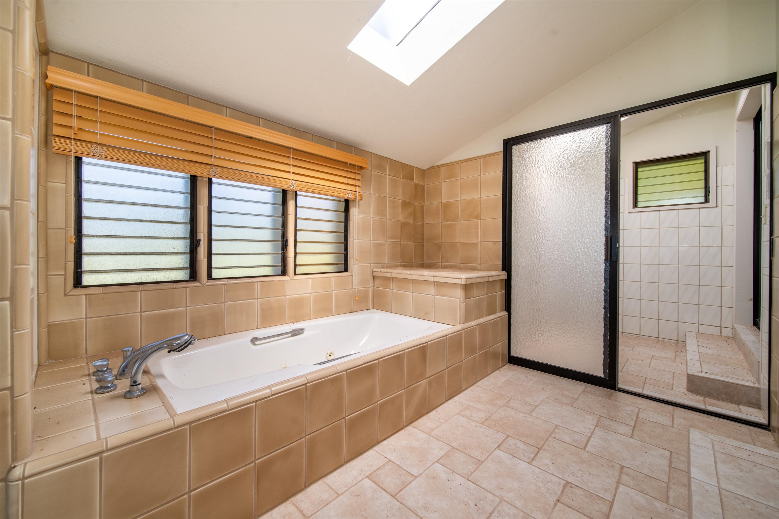4584 Makena Road Kihei, HI 96753 - Photo 20 of 30 a spacious bathroom with a tub and a shower