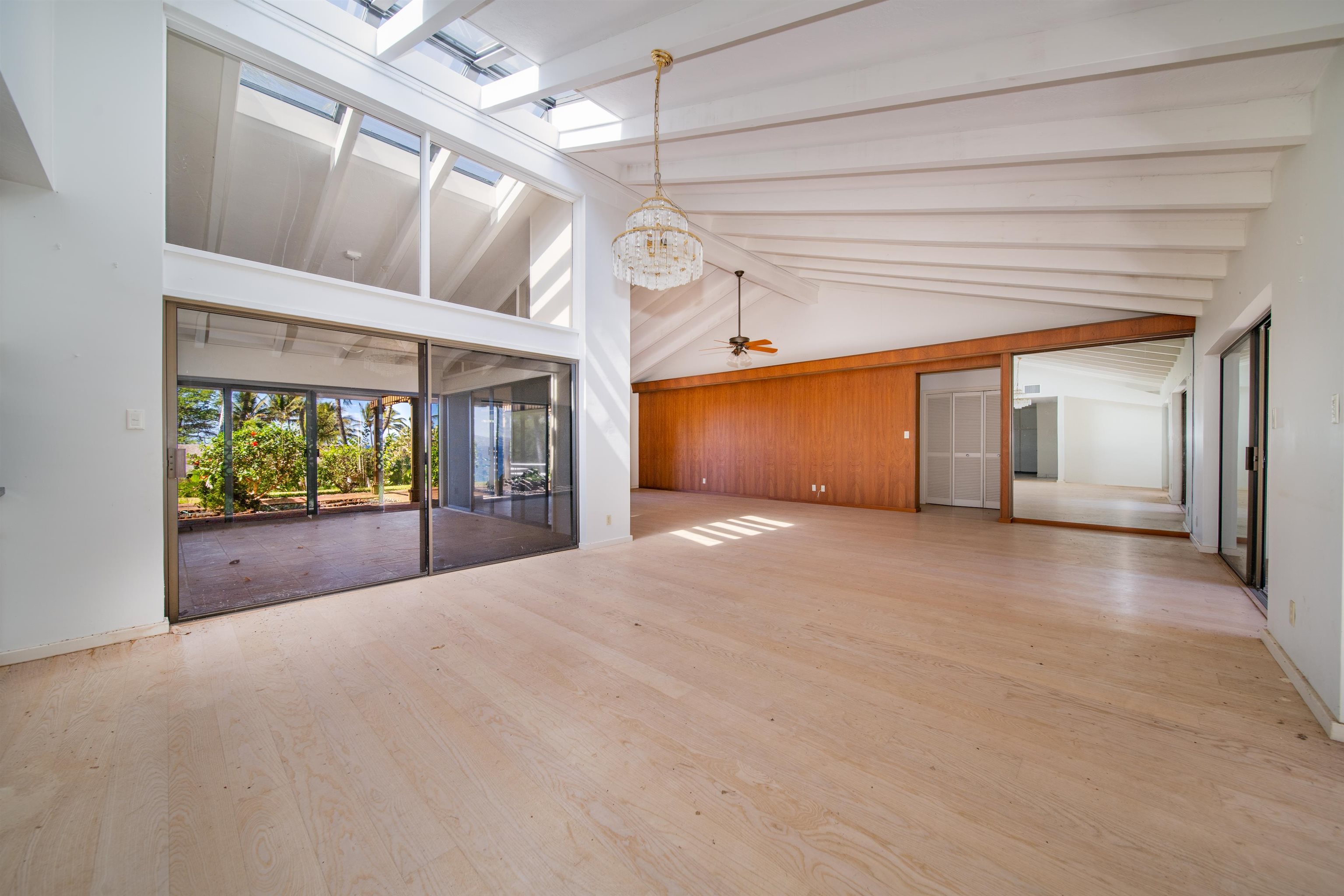 4584 Makena Road Kihei, HI 96753 - Photo 23 of 30 a view of a room with wooden floor and windows