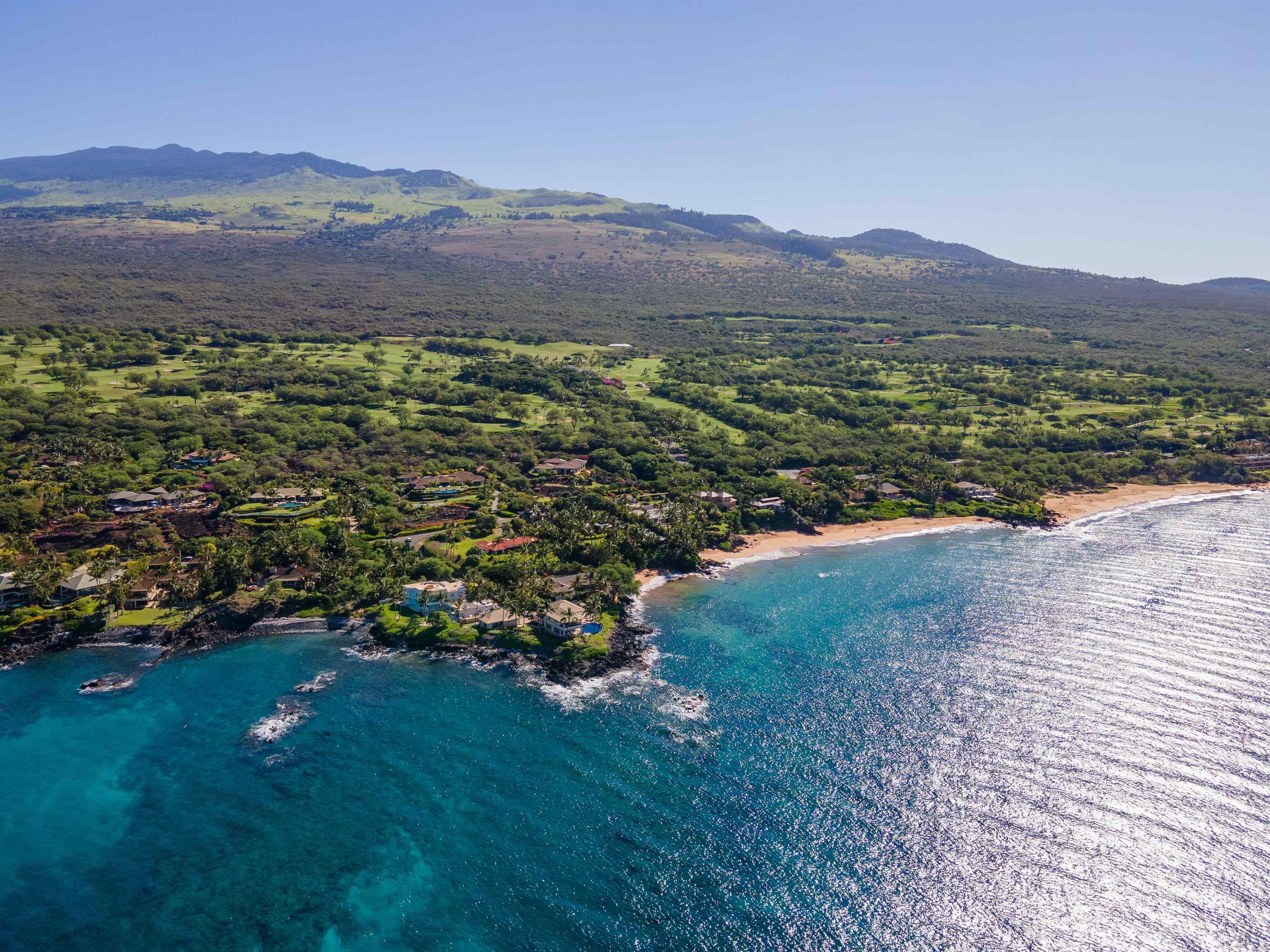 4584 Makena Road Kihei, HI 96753 - Photo 4 of 30 a view of a lush green hillside and houses