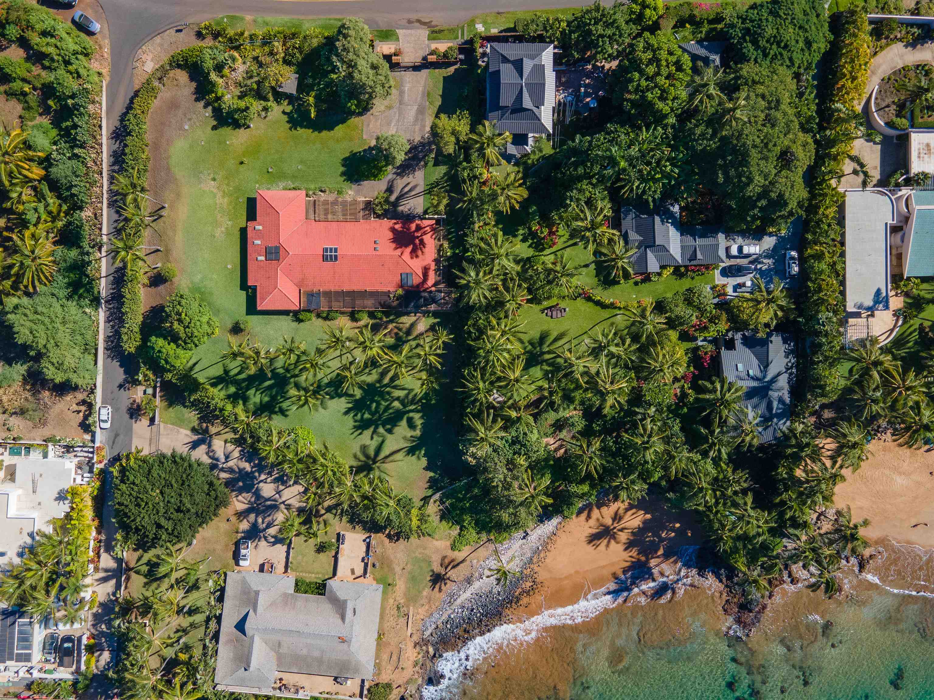 4584 Makena Road Kihei, HI 96753 - Photo 6 of 30 an aerial view of a house with a yard and garden