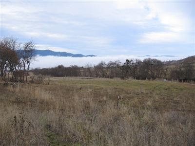 2005 Butler Creek Road Ashland, OR 97520 - Photo 14 of 15 a view of a lake with mountain