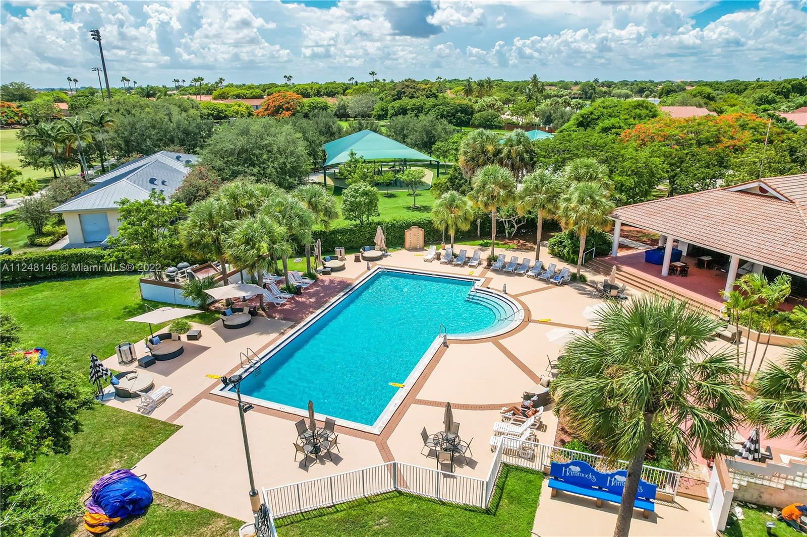 10505 Southwest 153rd Court, Unit 2 Miami, FL 33196 - Photo 12 of 39 an aerial view of a house with a garden and swimming pool