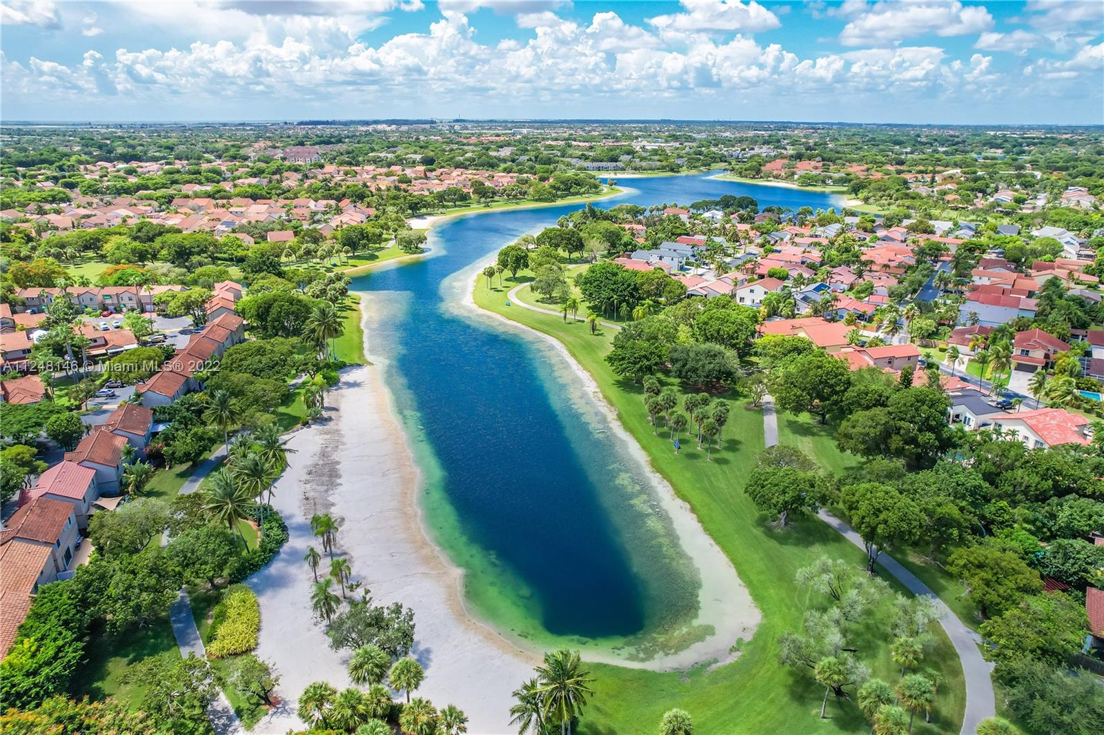 10505 Southwest 153rd Court, Unit 2 Miami, FL 33196 - Photo 14 of 39 a view of a lake with outdoor space