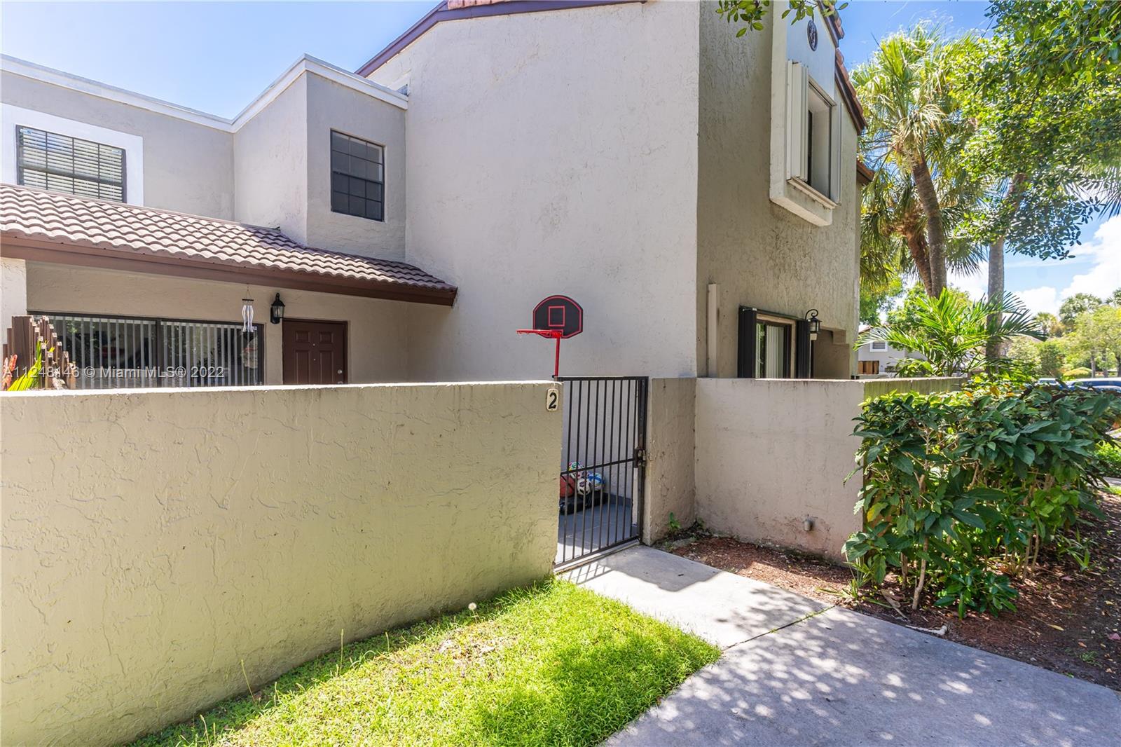 10505 Southwest 153rd Court, Unit 2 Miami, FL 33196 - Photo 18 of 39 a view of a backyard
