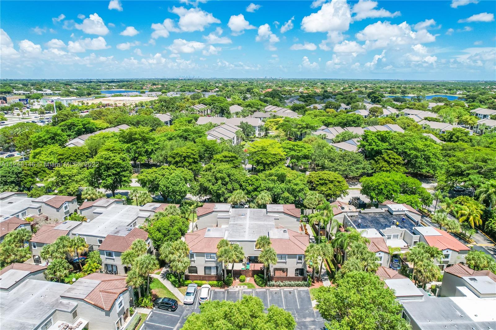 10505 Southwest 153rd Court, Unit 2 Miami, FL 33196 - Photo 2 of 39 an aerial view of a house with a yard