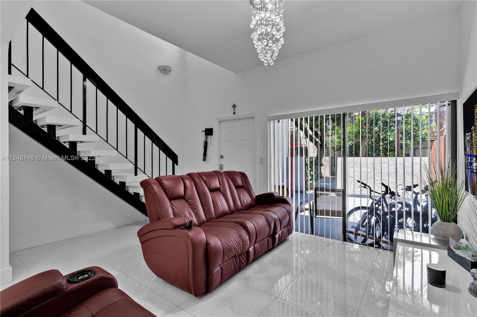 10505 Southwest 153rd Court, Unit 2 Miami, FL 33196 - Photo 26 of 39 a living room with furniture