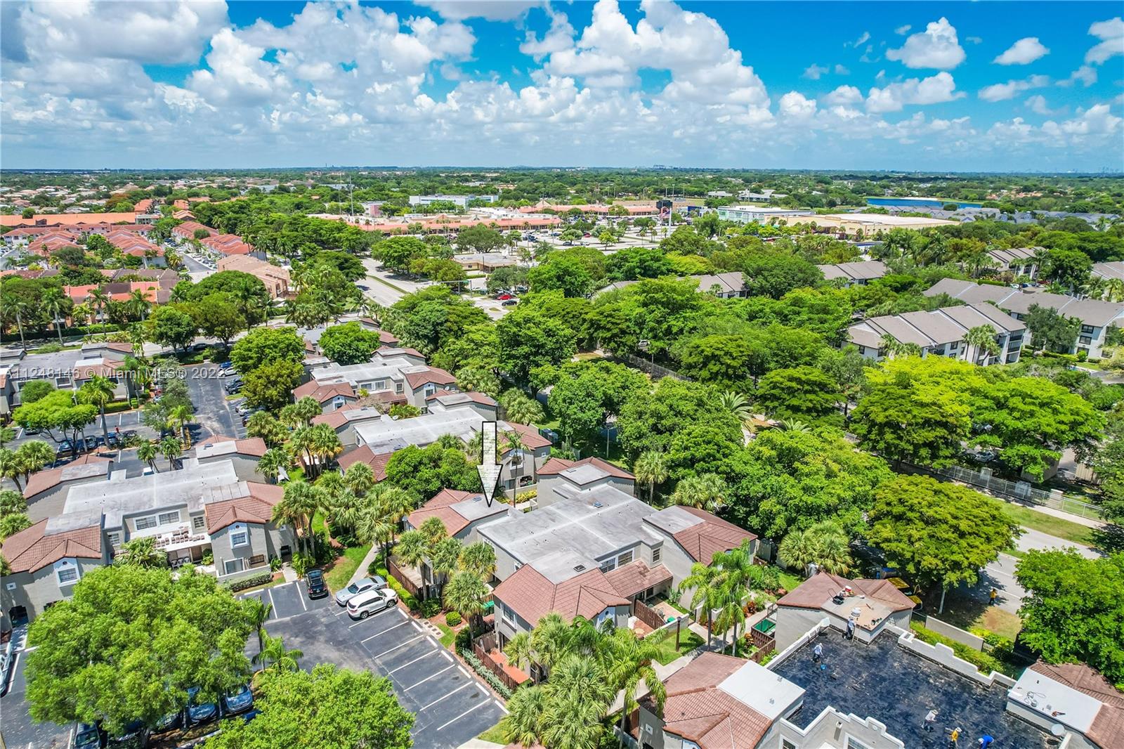 10505 Southwest 153rd Court, Unit 2 Miami, FL 33196 - Photo 3 of 39 a view of a city with an ocean