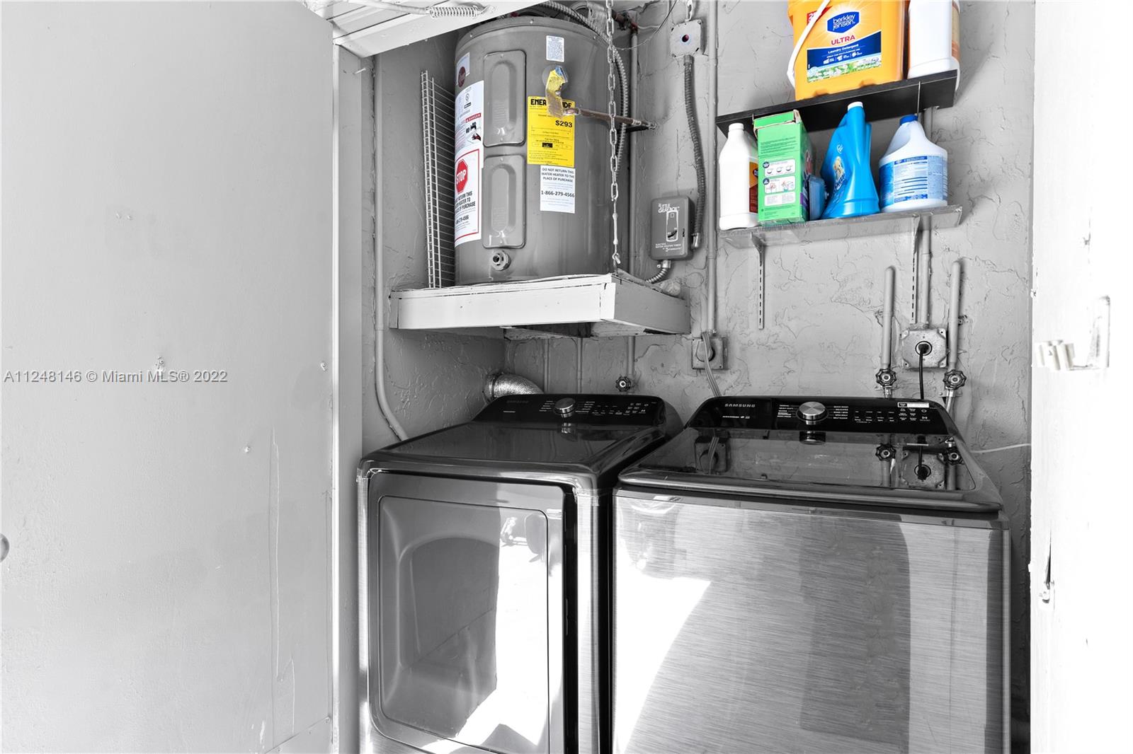 10505 Southwest 153rd Court, Unit 2 Miami, FL 33196 - Photo 31 of 39 a kitchen with stainless steel appliances granite countertop a stove and a sink