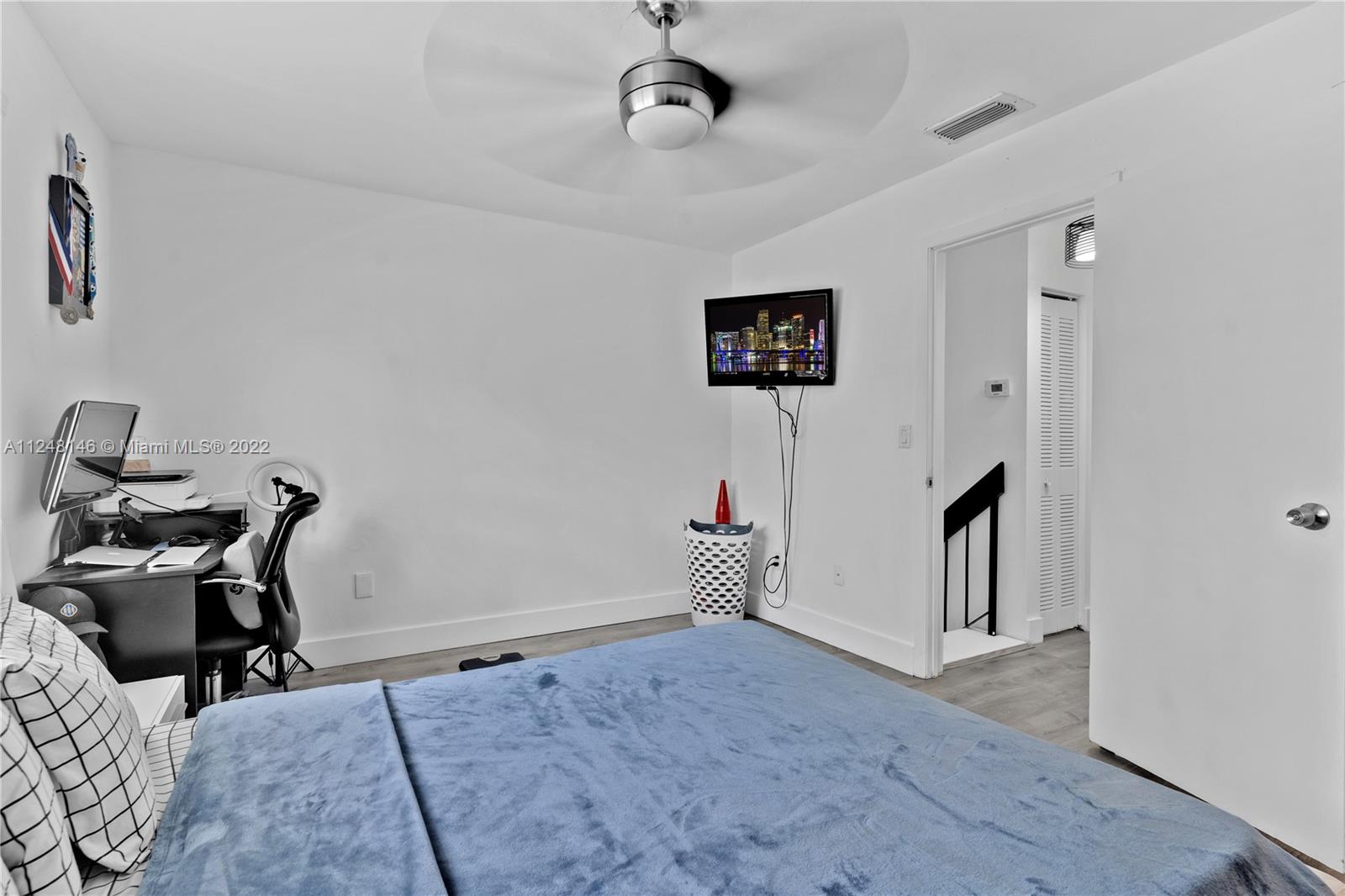 10505 Southwest 153rd Court, Unit 2 Miami, FL 33196 - Photo 35 of 39 a view of a workspace with furniture and a window