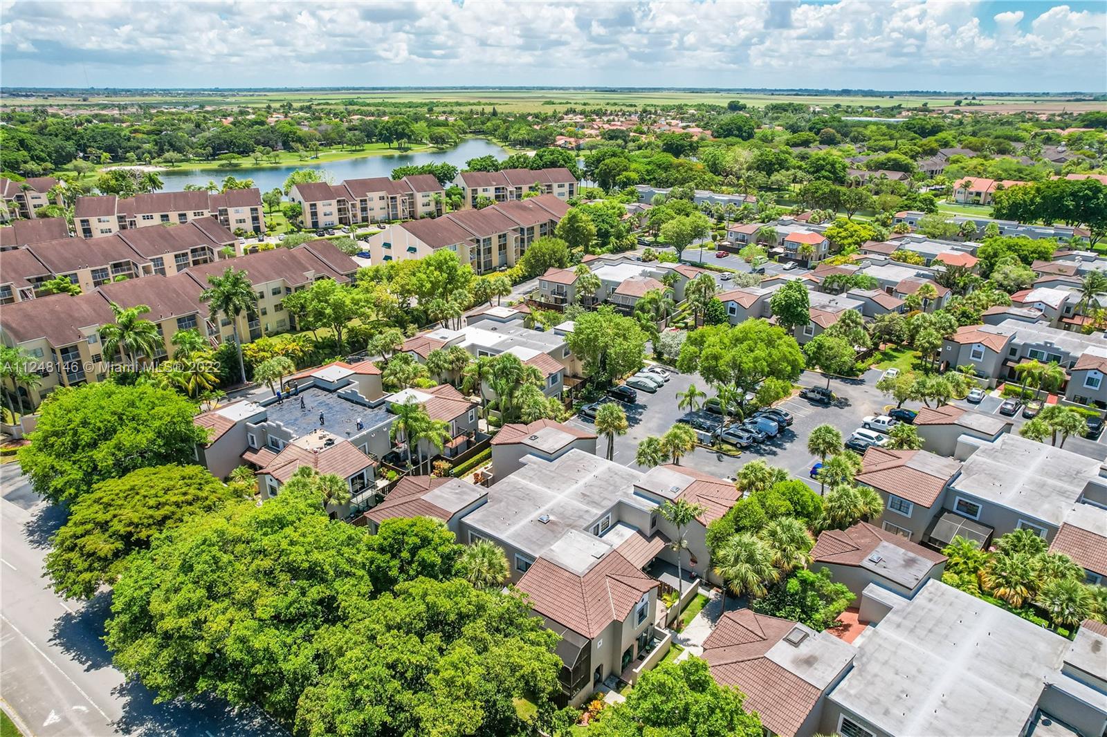 10505 Southwest 153rd Court, Unit 2 Miami, FL 33196 - Photo 6 of 39 an aerial view of a house with a garden