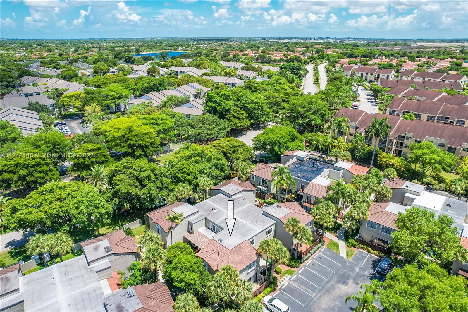 10505 Southwest 153rd Court, Unit 2 Miami, FL 33196 - Photo 7 of 39 an aerial view of a house with a garden