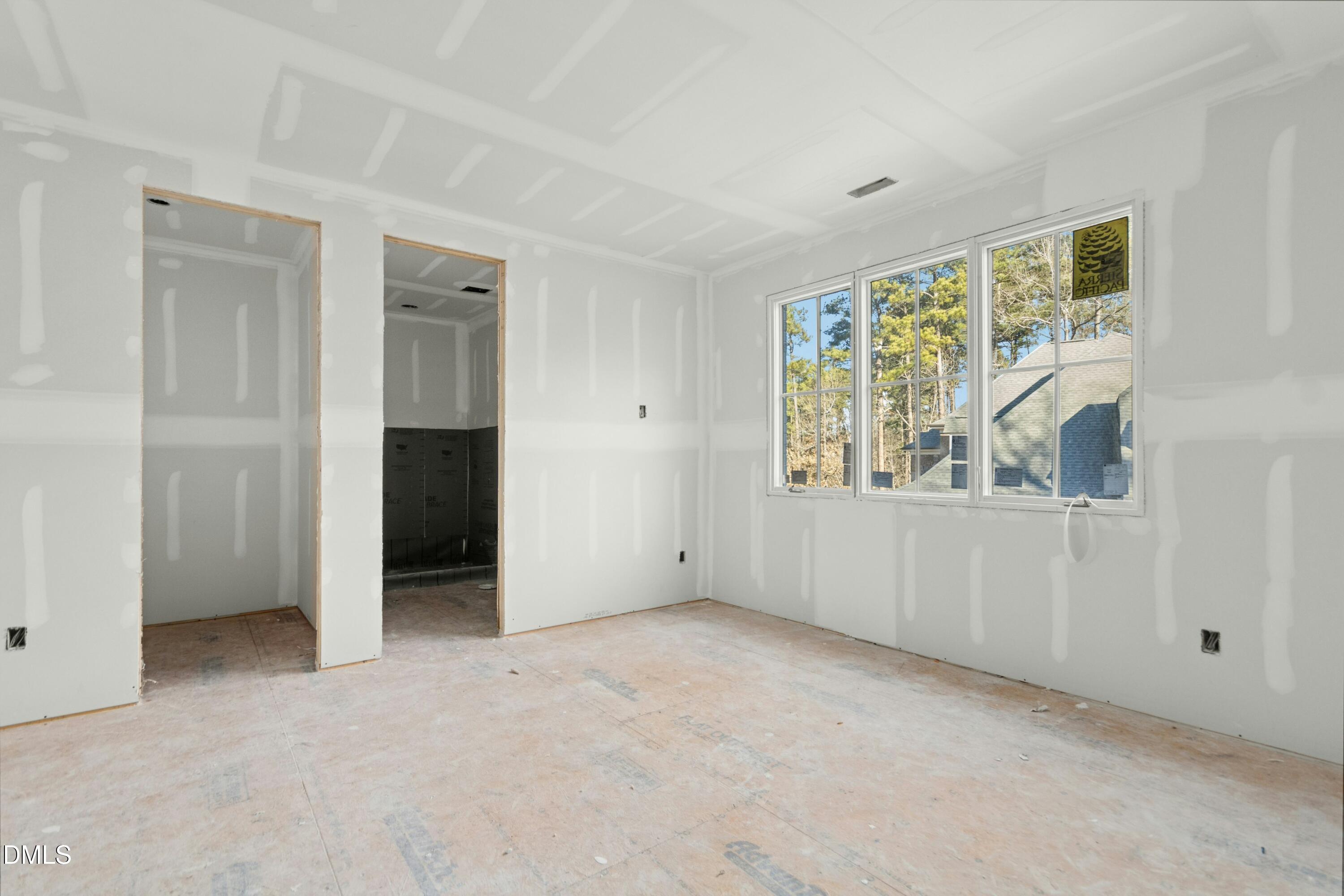 2024 Cadenza Lane Raleigh, NC 27614 - Photo 11 of 29 a view of an empty room with a window