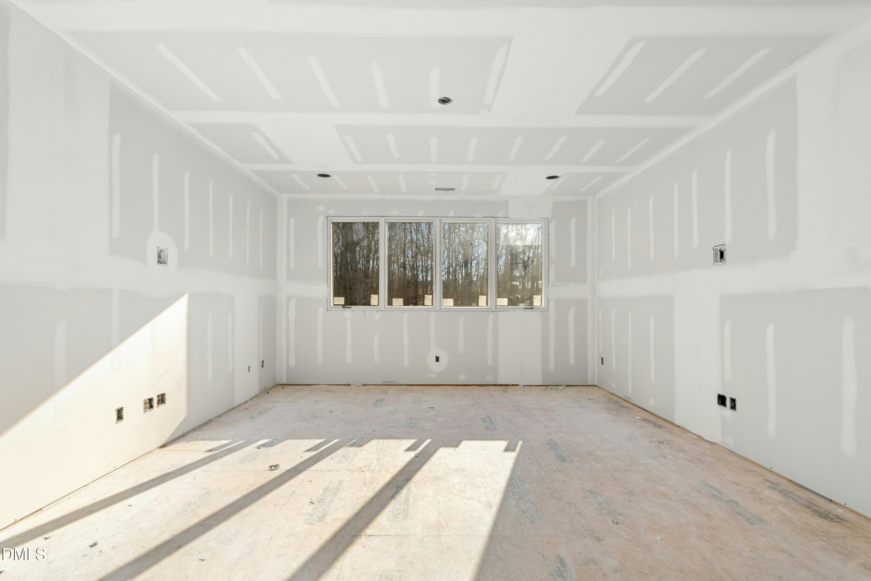 2024 Cadenza Lane Raleigh, NC 27614 - Photo 12 of 29 a view of an empty room with a window