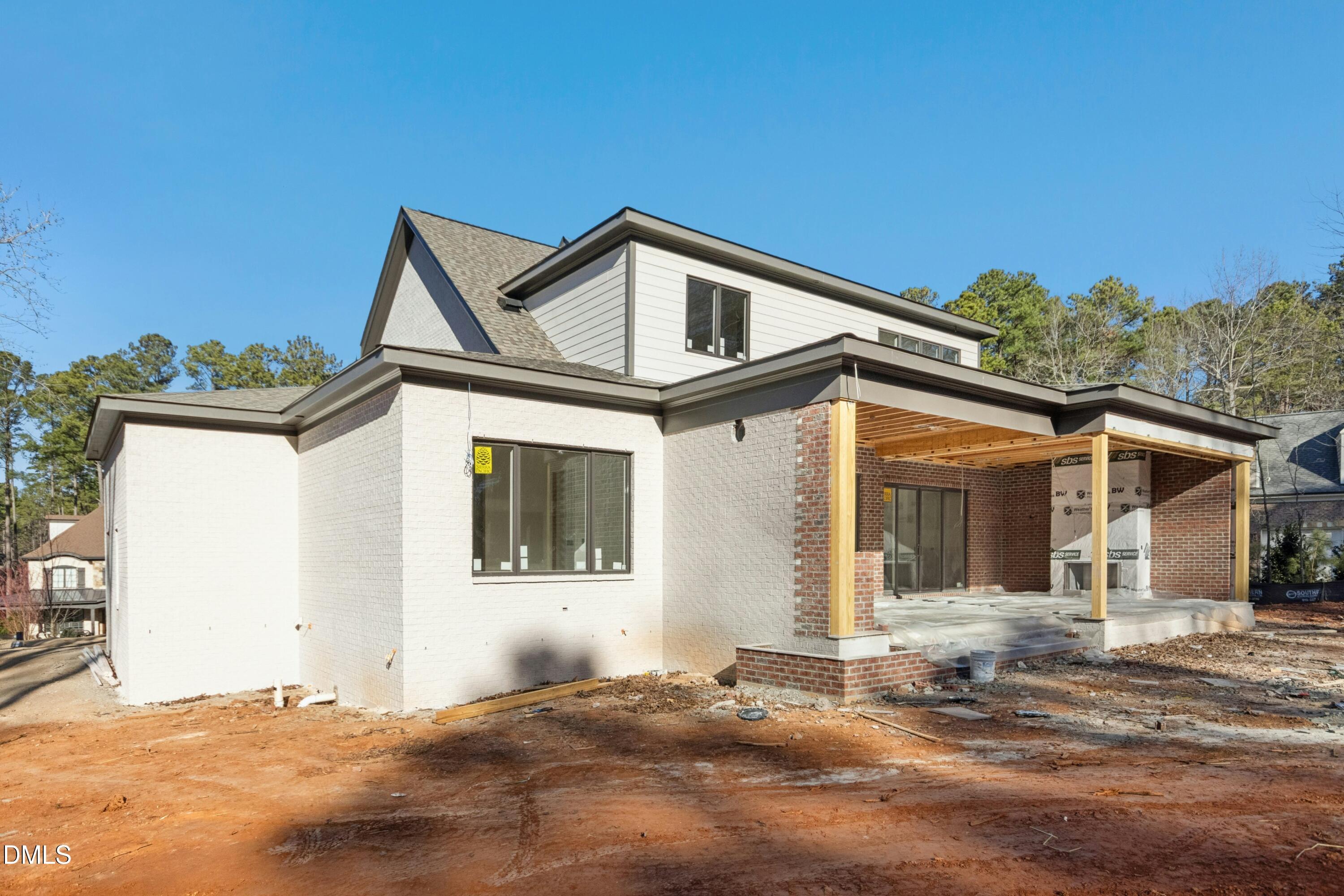 2024 Cadenza Lane Raleigh, NC 27614 - Photo 15 of 29 a front view of a house with a yard