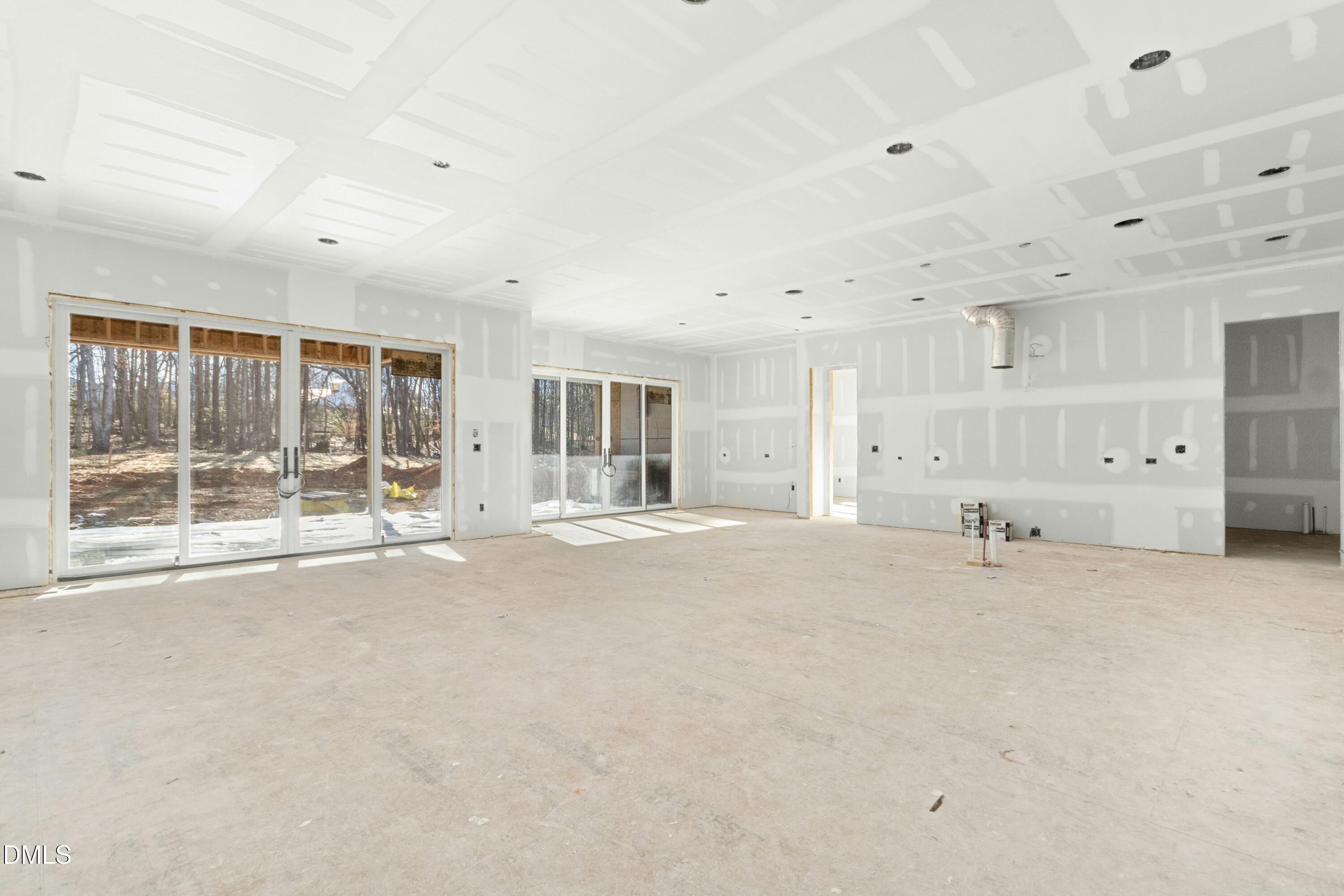 2024 Cadenza Lane Raleigh, NC 27614 - Photo 3 of 29 a large white room with natural light