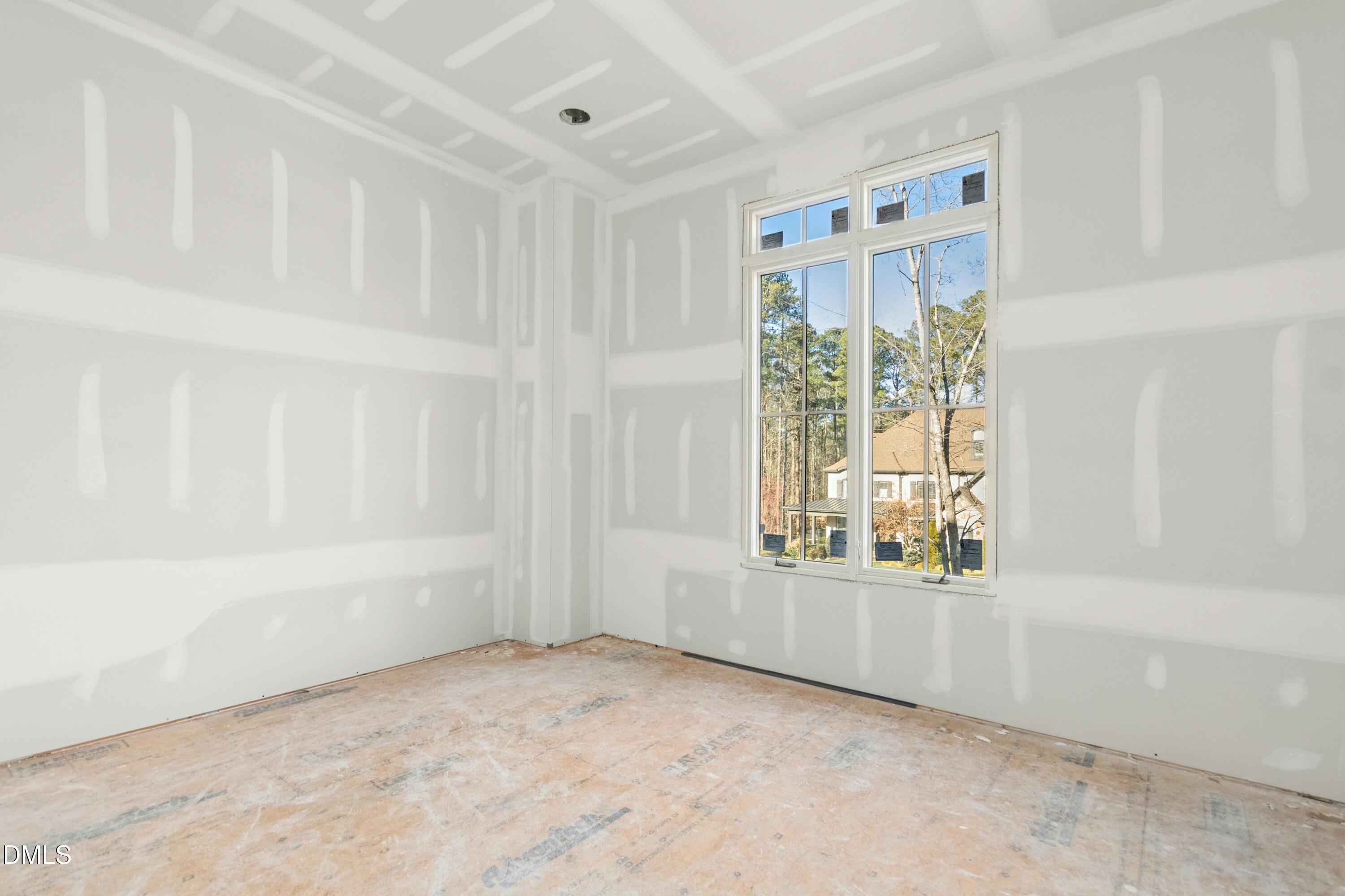 2024 Cadenza Lane Raleigh, NC 27614 - Photo 7 of 29 a view of an empty room with a window