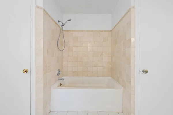 a bathroom with a bathtub