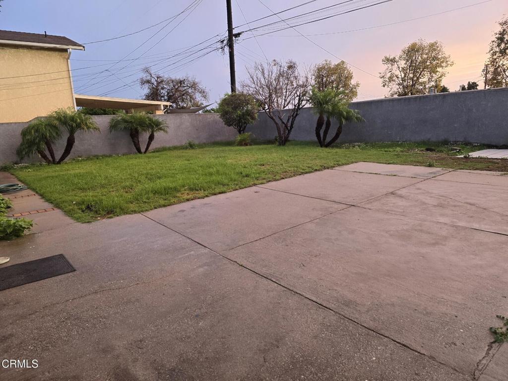 326 Simon Way Oxnard, CA 93036 - Photo 9 of 10 a view of a house with backyard and a tree