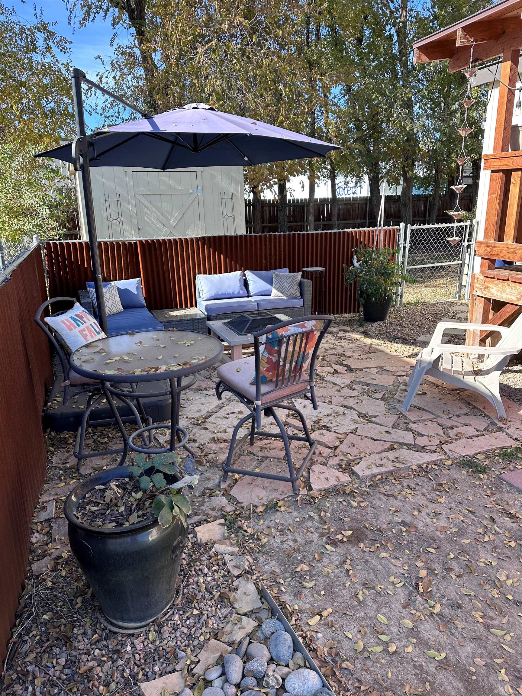 585-25 25 1/2 Road, Unit 125 Grand Junction, CO 81505 - Photo 22 of 24 a view of a patio with a table and chairs