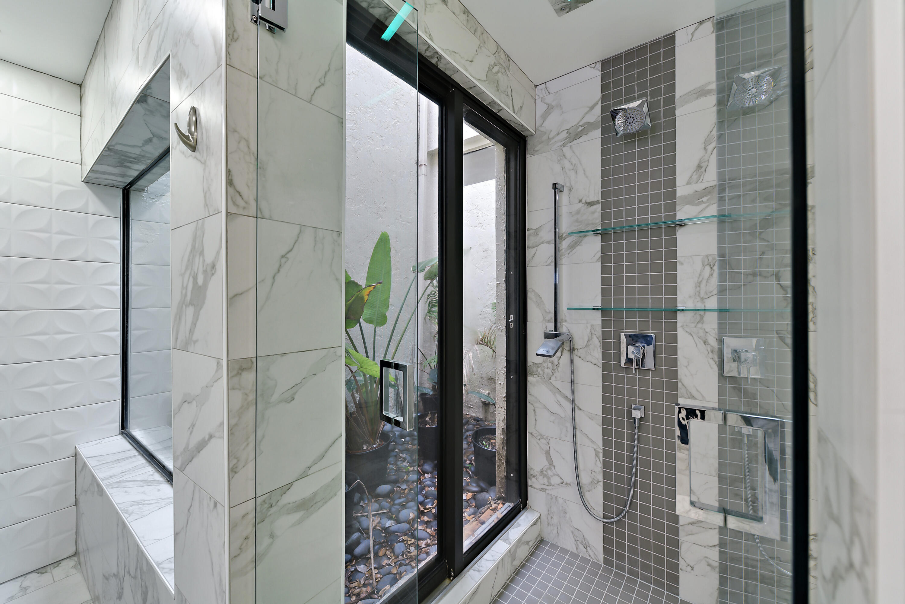 7493 Campo Florido Boca Raton, FL 33433 - Photo 24 of 62 a bathroom with a glass door shower and a sink