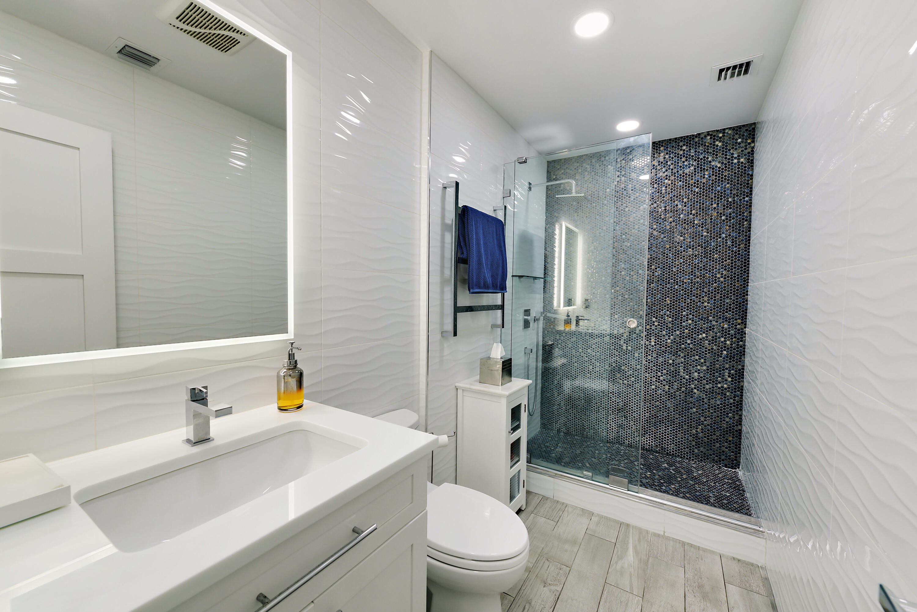 7493 Campo Florido Boca Raton, FL 33433 - Photo 27 of 62 a bathroom with a sink a toilet and shower
