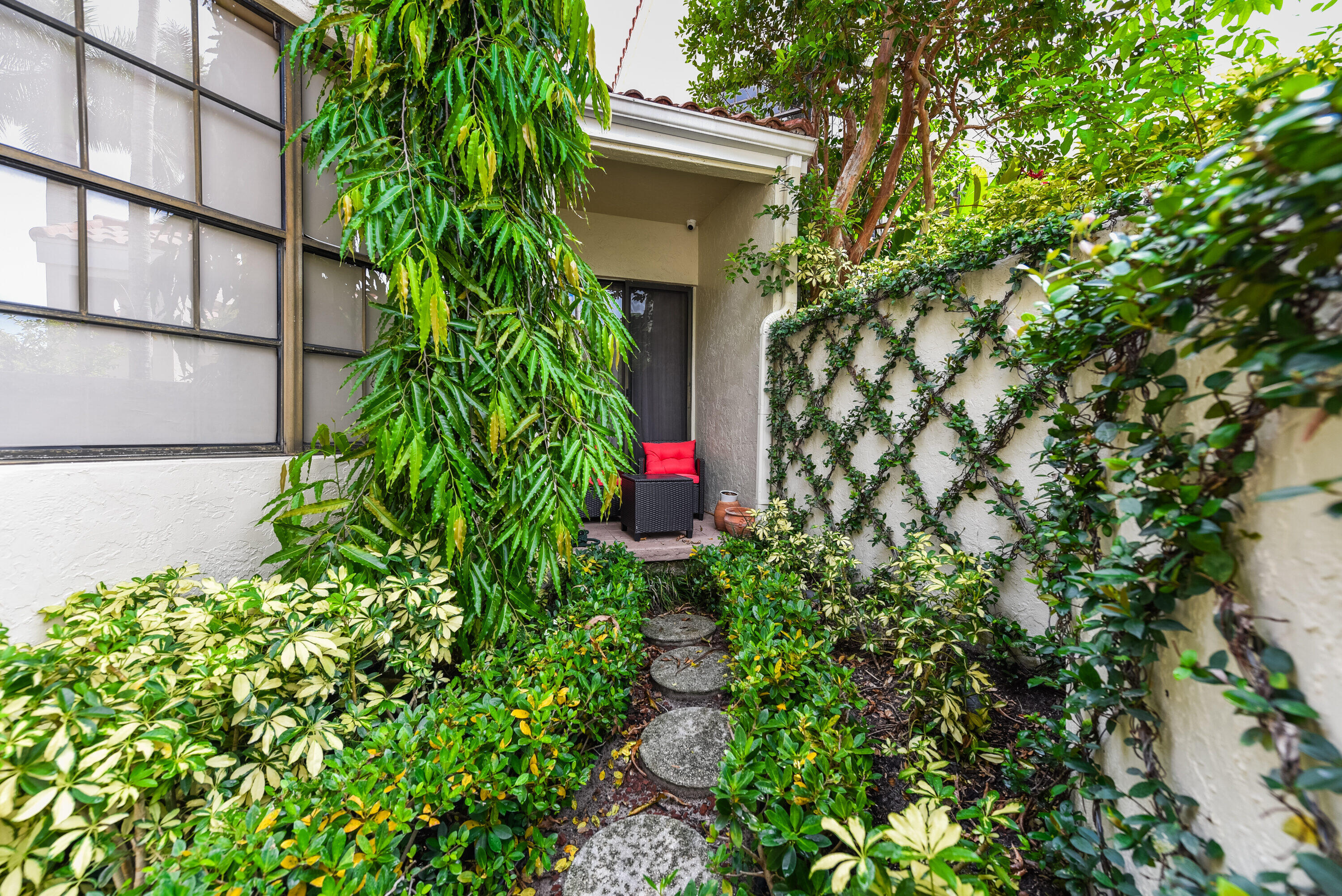 7493 Campo Florido Boca Raton, FL 33433 - Photo 30 of 62 a backyard of a house with lots of green space