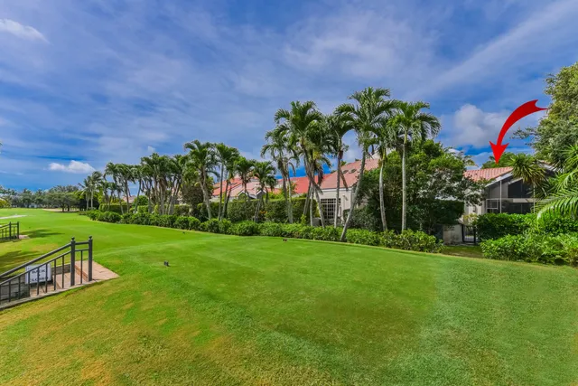 a view of a lake with a big yard