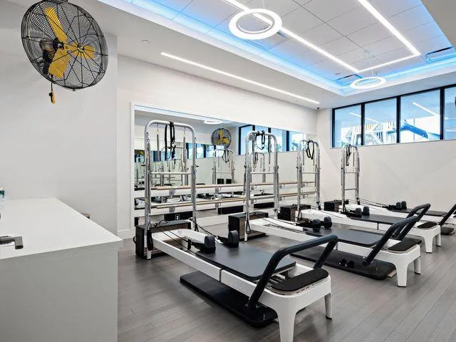 a view of game room with gym equipment