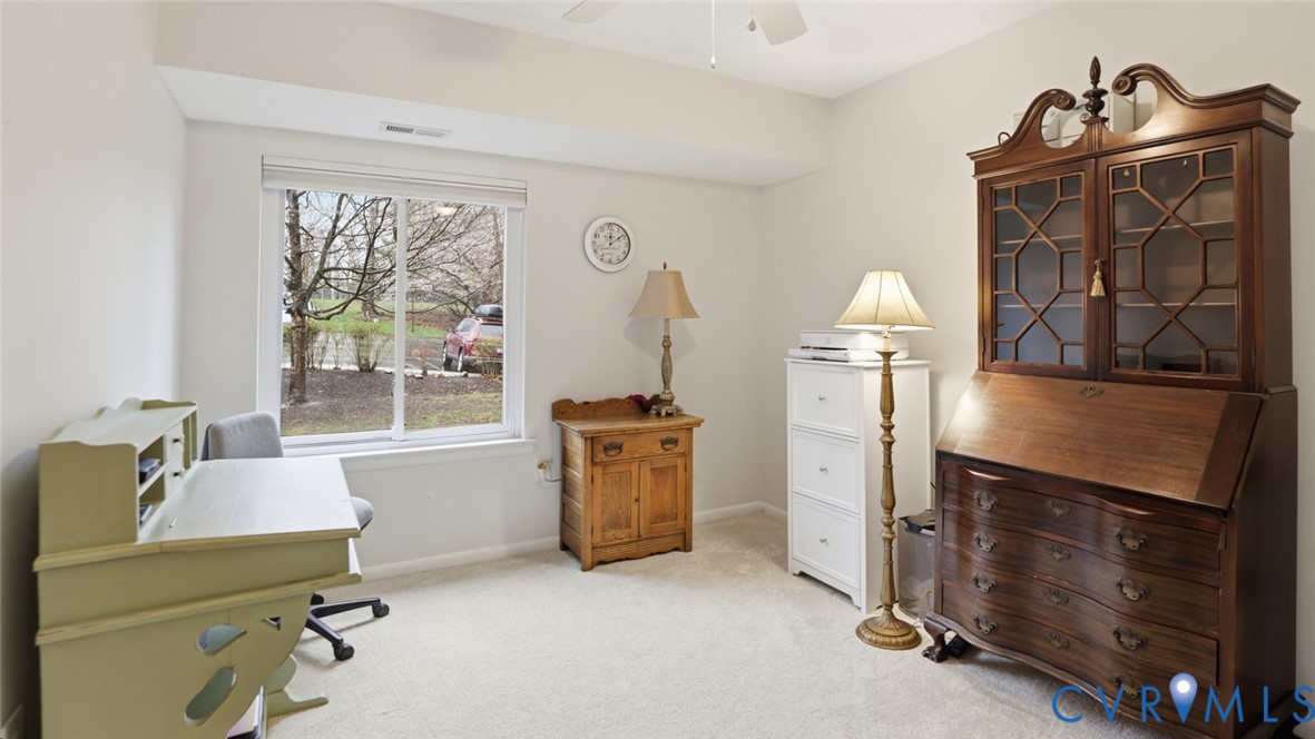 1513 Regency Woods Road, Unit 101 Henrico, VA 23238 - Photo 28 of 50 a living room with furniture and a window