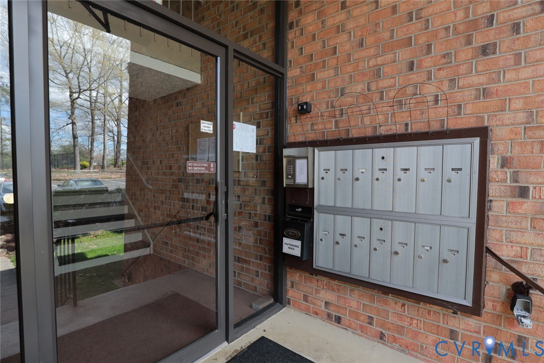 1513 Regency Woods Road, Unit 101 Henrico, VA 23238 - Photo 35 of 50 a view of a wooden door of a house