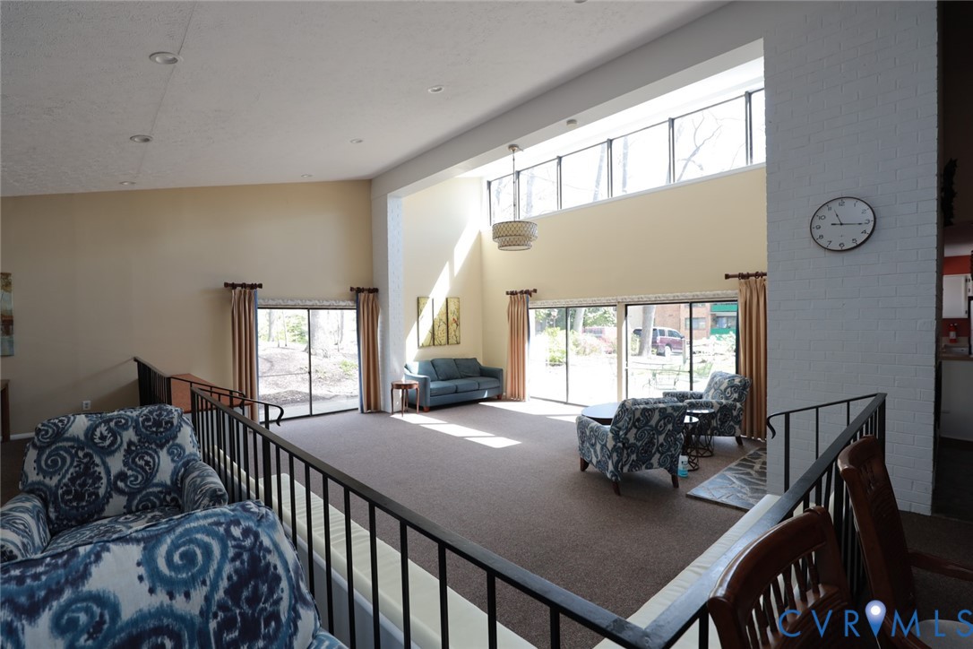 1513 Regency Woods Road, Unit 101 Henrico, VA 23238 - Photo 39 of 50 a view of a dining room with furniture window and outside view