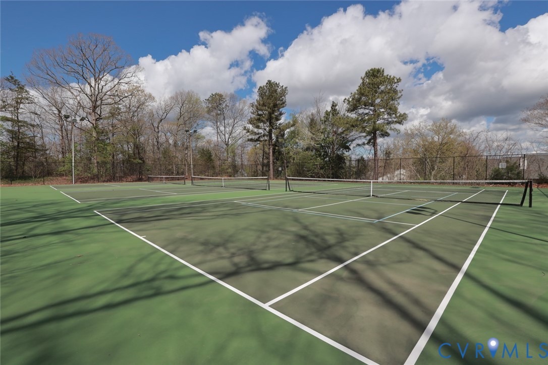 1513 Regency Woods Road, Unit 101 Henrico, VA 23238 - Photo 46 of 50 a view of an outdoor space and tennis court