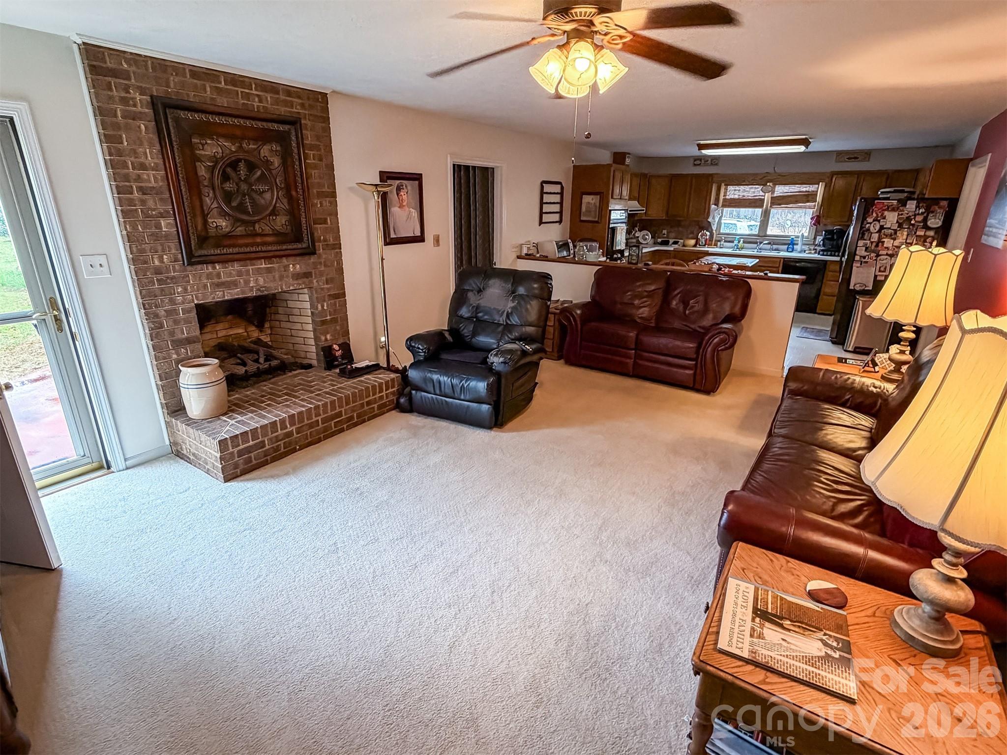 1017 3rd Avenue Northwest Conover, NC 28613 - Photo 11 of 46 a living room with furniture and kitchen view