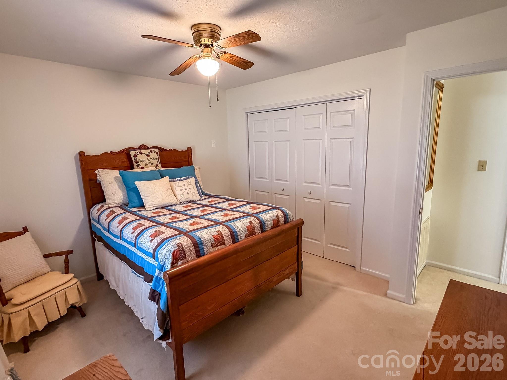 1017 3rd Avenue Northwest Conover, NC 28613 - Photo 30 of 46 a bedroom with a bed and a lamp