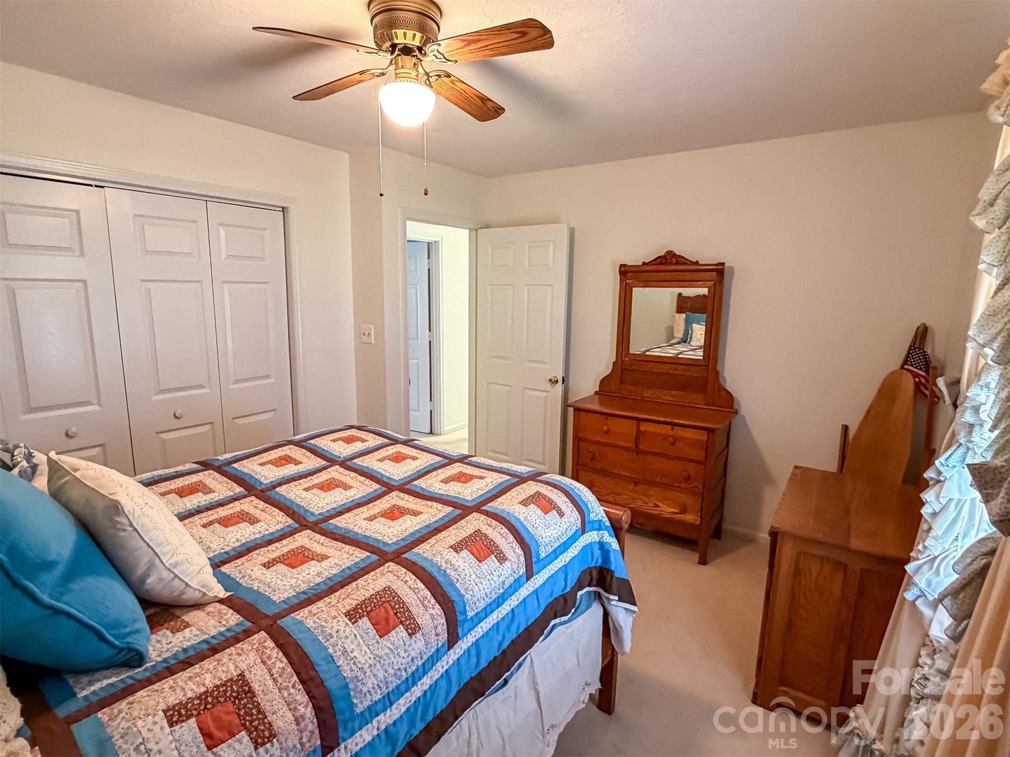 1017 3rd Avenue Northwest Conover, NC 28613 - Photo 31 of 46 a bedroom with a bed and wooden floor