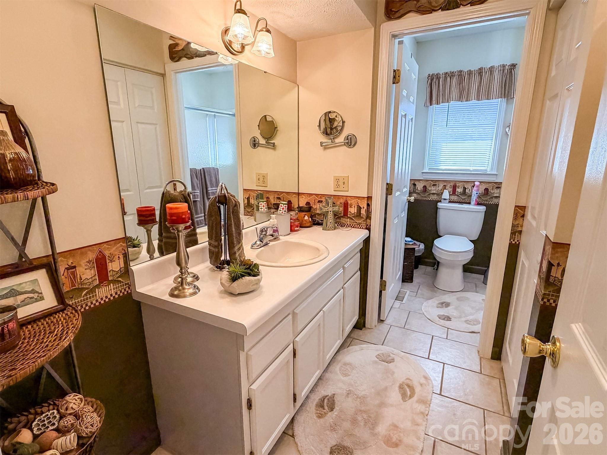1017 3rd Avenue Northwest Conover, NC 28613 - Photo 33 of 46 a bathroom with a sink toilet and shower
