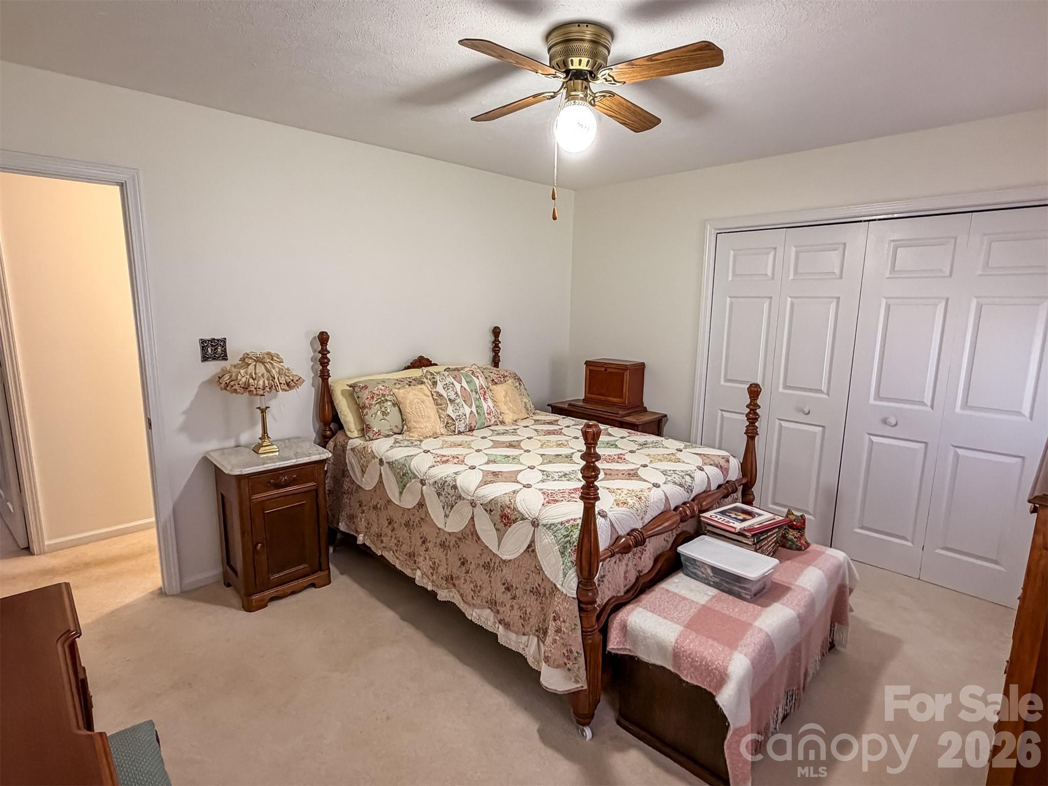 1017 3rd Avenue Northwest Conover, NC 28613 - Photo 38 of 46 a bedroom with a bed and ceiling fan