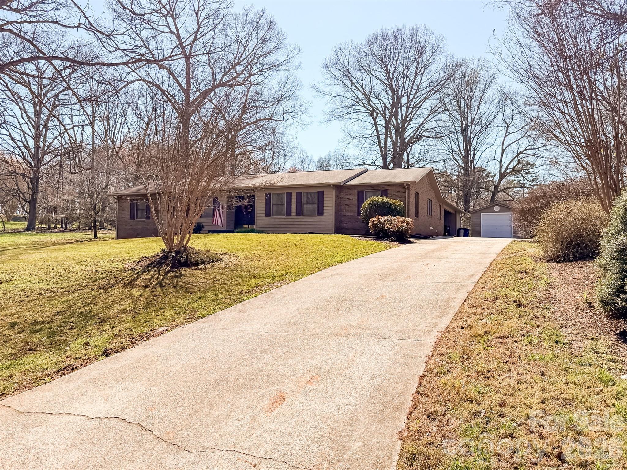 1017 3rd Avenue Northwest Conover, NC 28613 - Photo 42 of 46 a view of a house with snow yard and trees