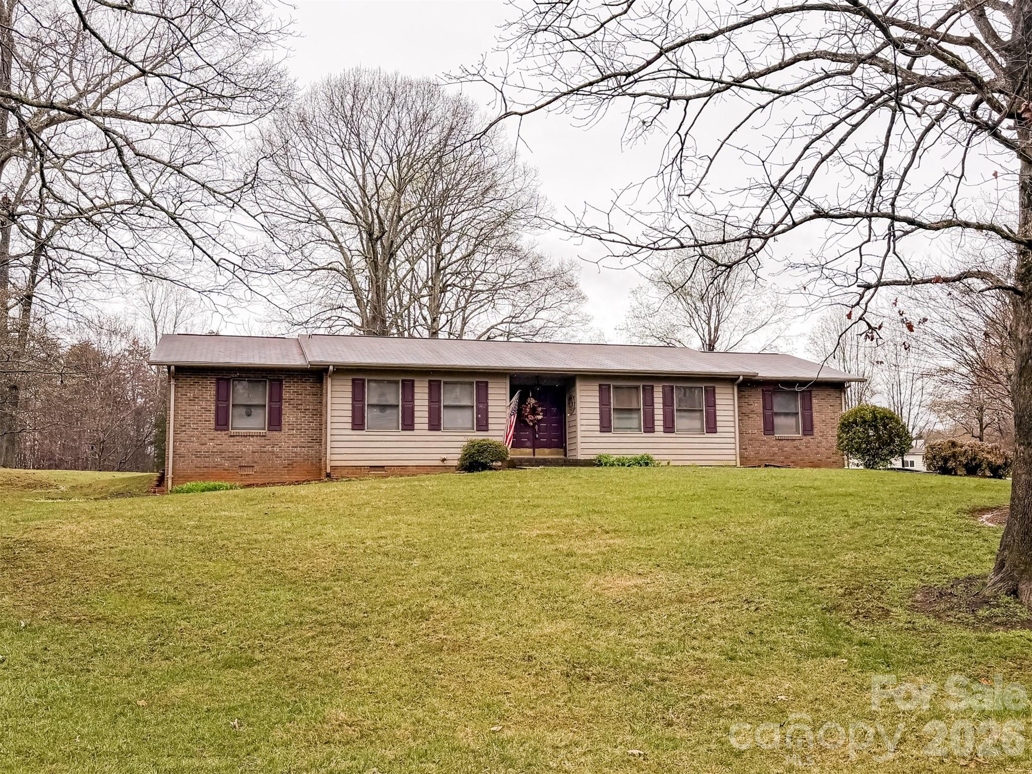 1017 3rd Avenue Northwest Conover, NC 28613 - Photo 43 of 46 a front view of a house with a yard
