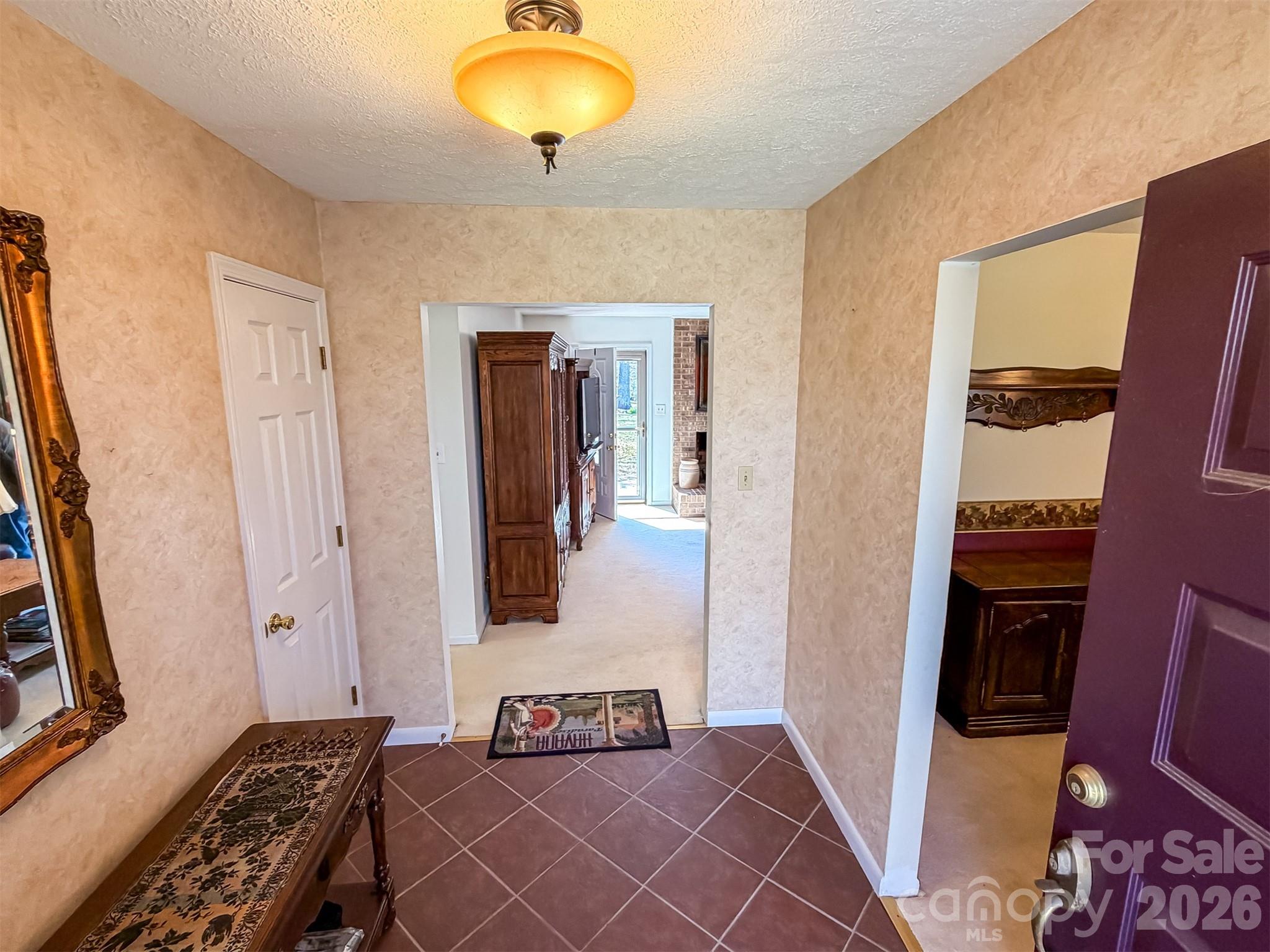 1017 3rd Avenue Northwest Conover, NC 28613 - Photo 7 of 46 a bedroom with a bed and a mirror