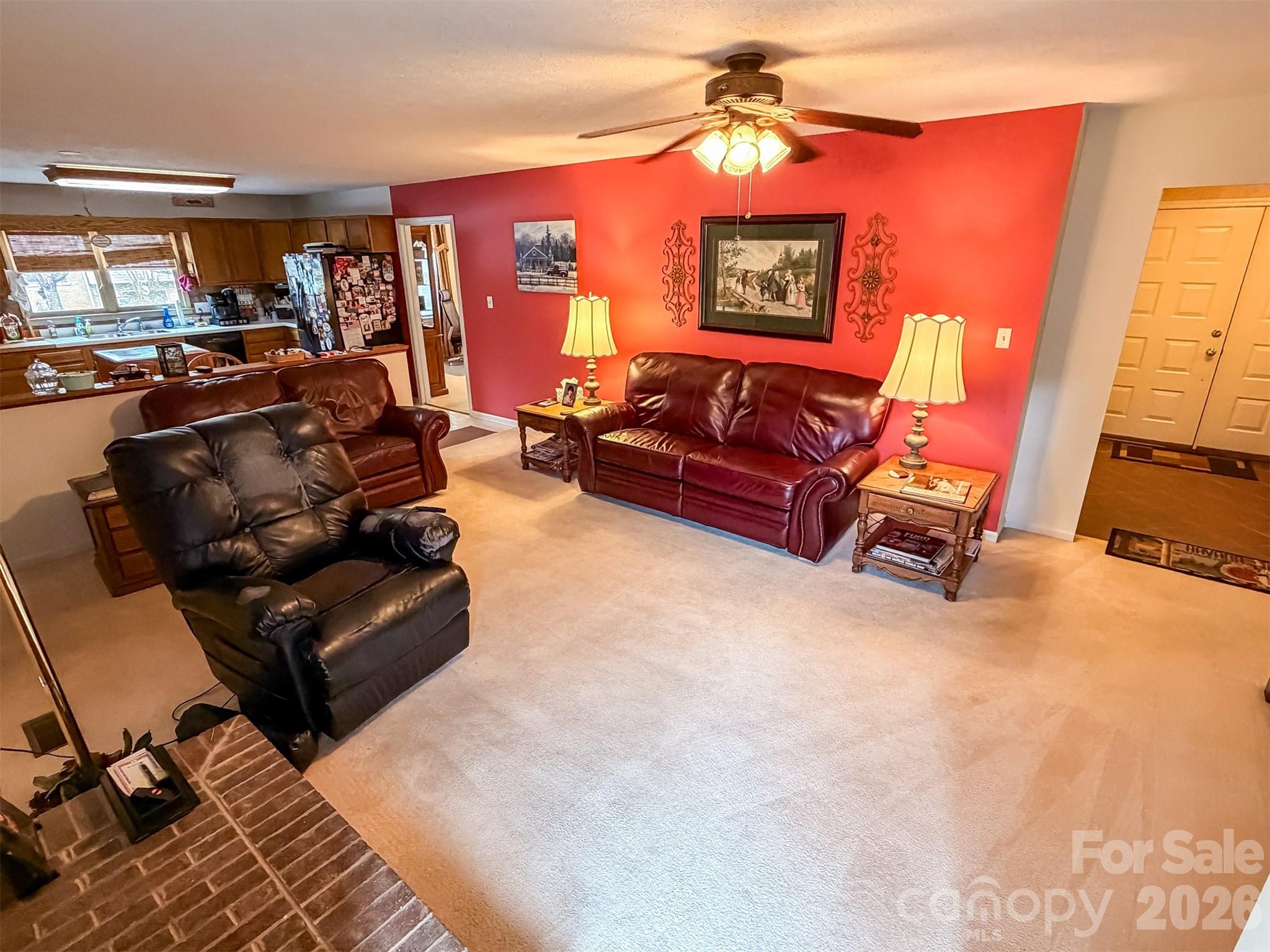 1017 3rd Avenue Northwest Conover, NC 28613 - Photo 10 of 46 a living room with furniture and a flat screen tv