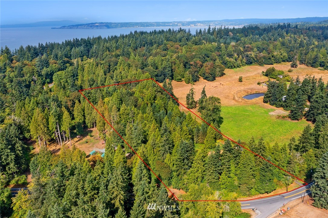 6960 Maxwelton Road Clinton, WA 98236 - Photo 32 of 40 a view of a lake with a mountain