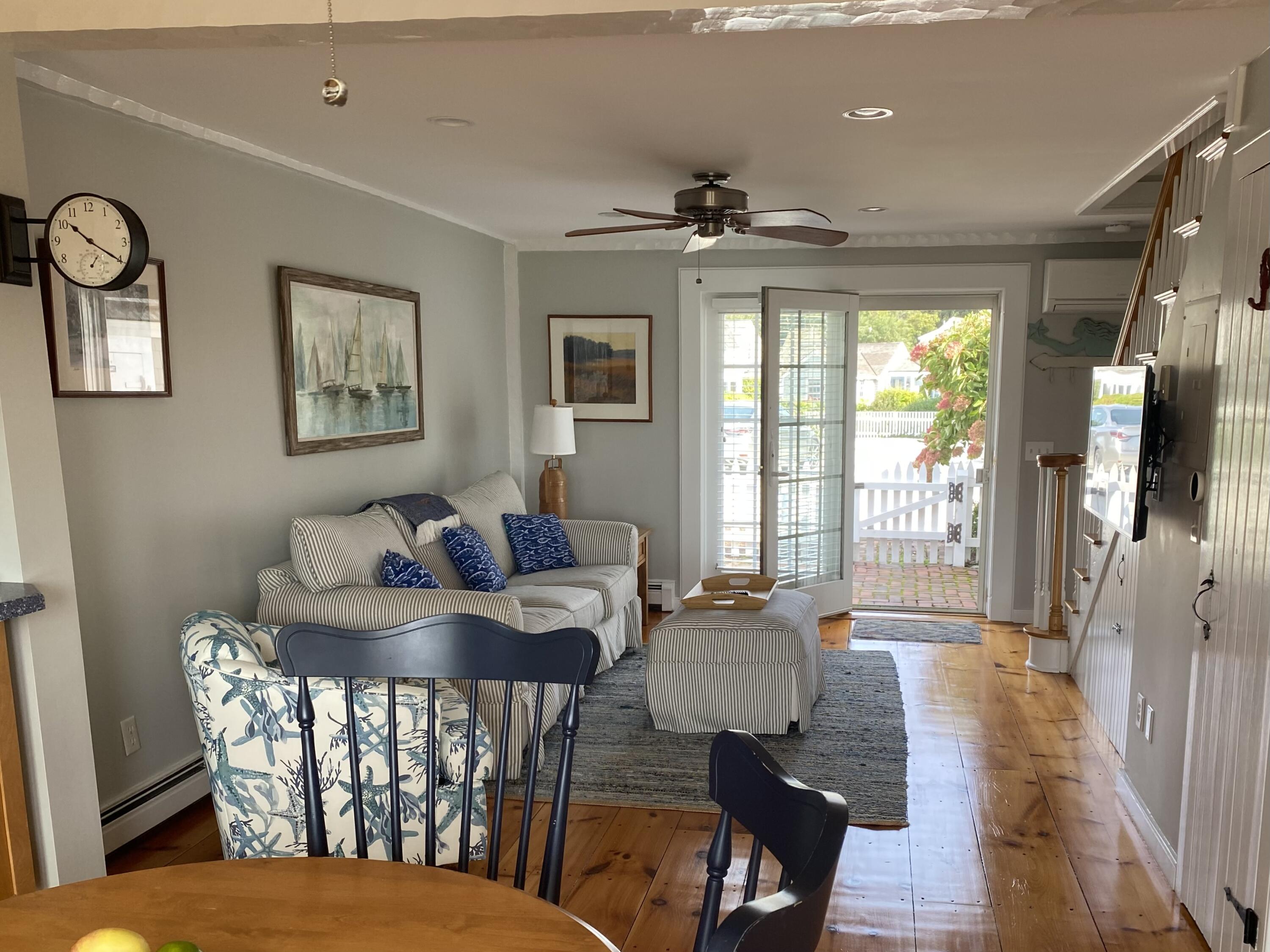 4 Race Point Road Mashpee, MA 02649 - Photo 13 of 37 a living room with furniture and a large window