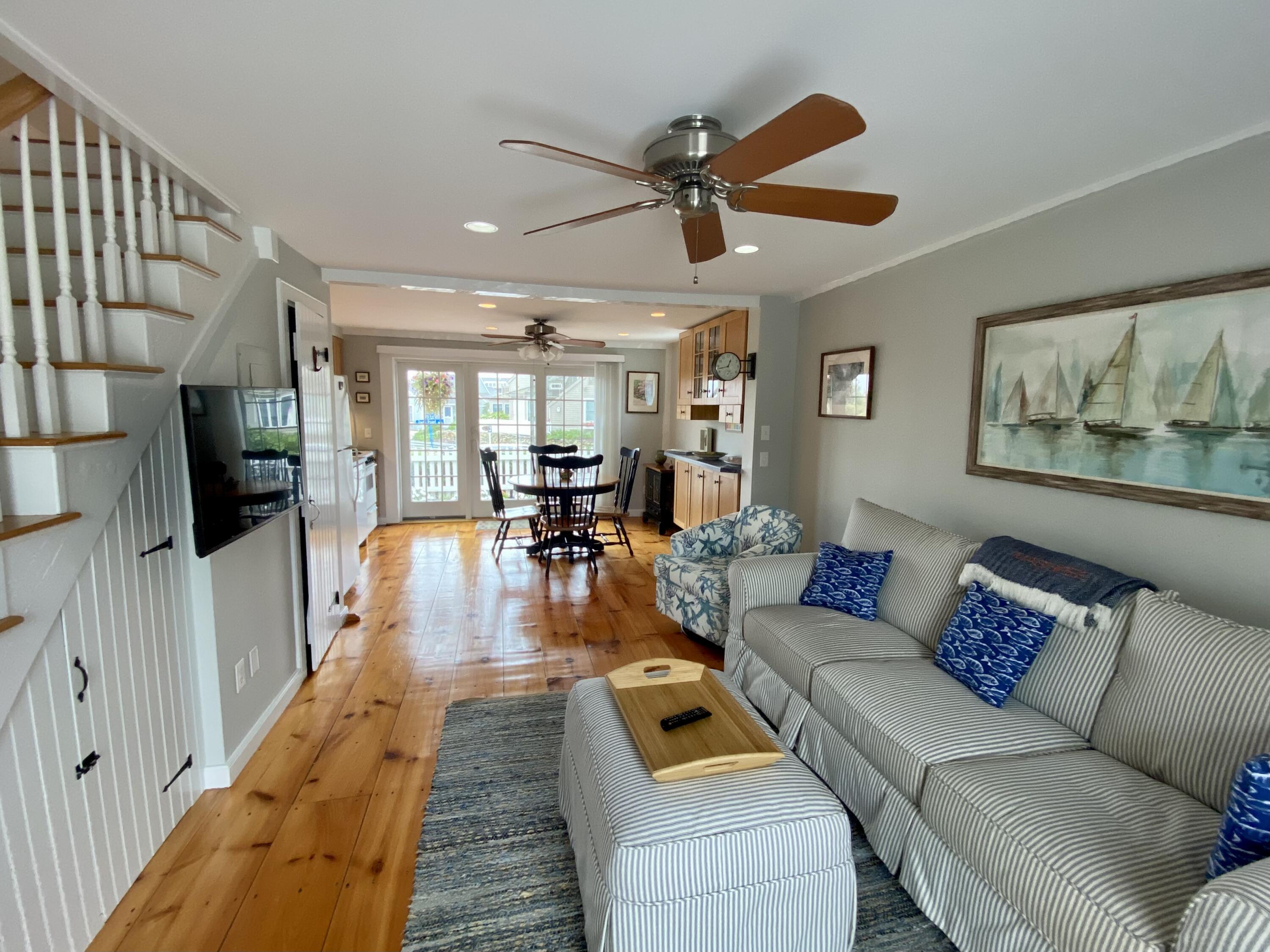 4 Race Point Road Mashpee, MA 02649 - Photo 14 of 37 a living room with furniture and a flat screen tv