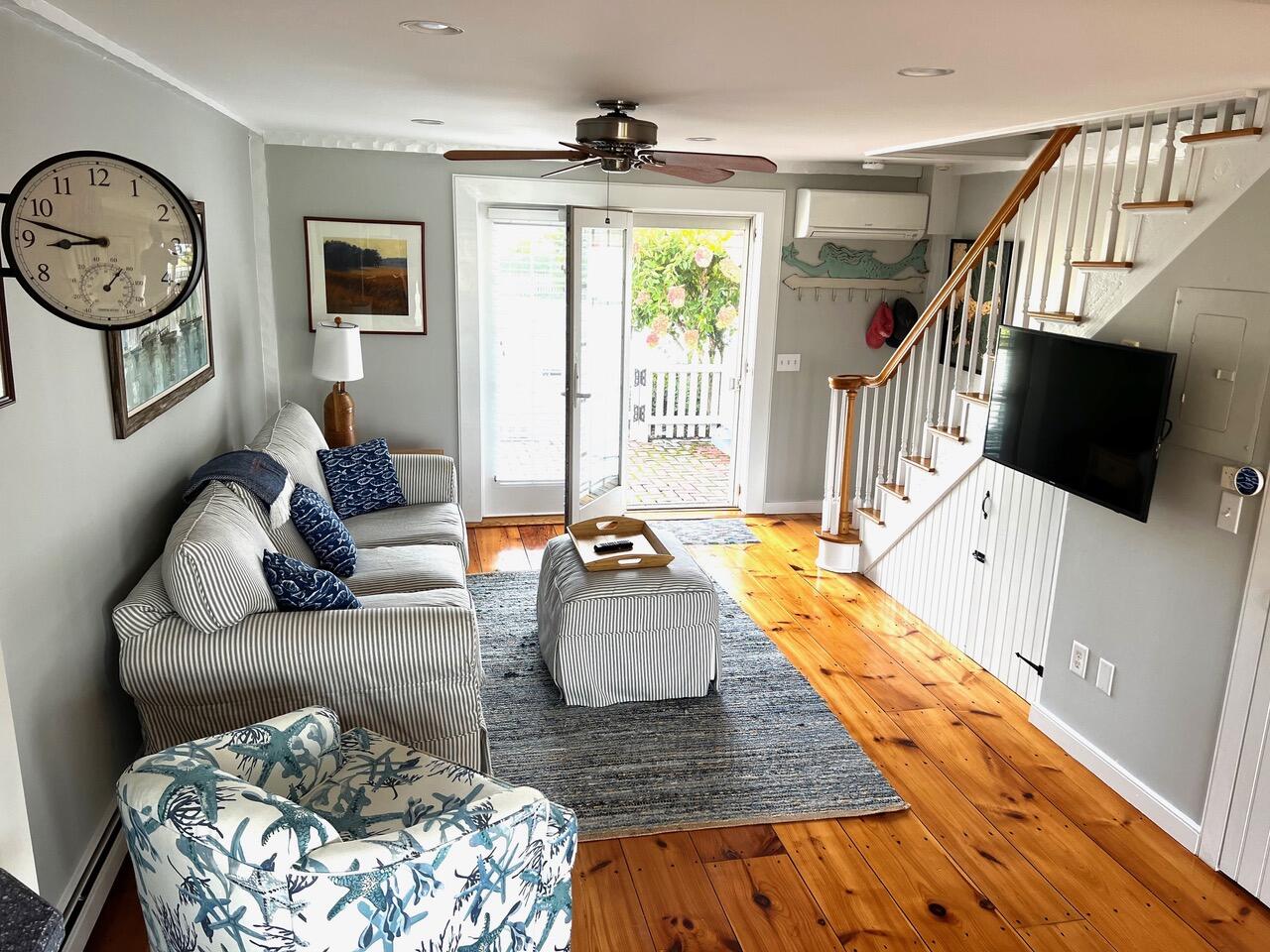 4 Race Point Road Mashpee, MA 02649 - Photo 21 of 37 a living room with furniture and a flat screen tv