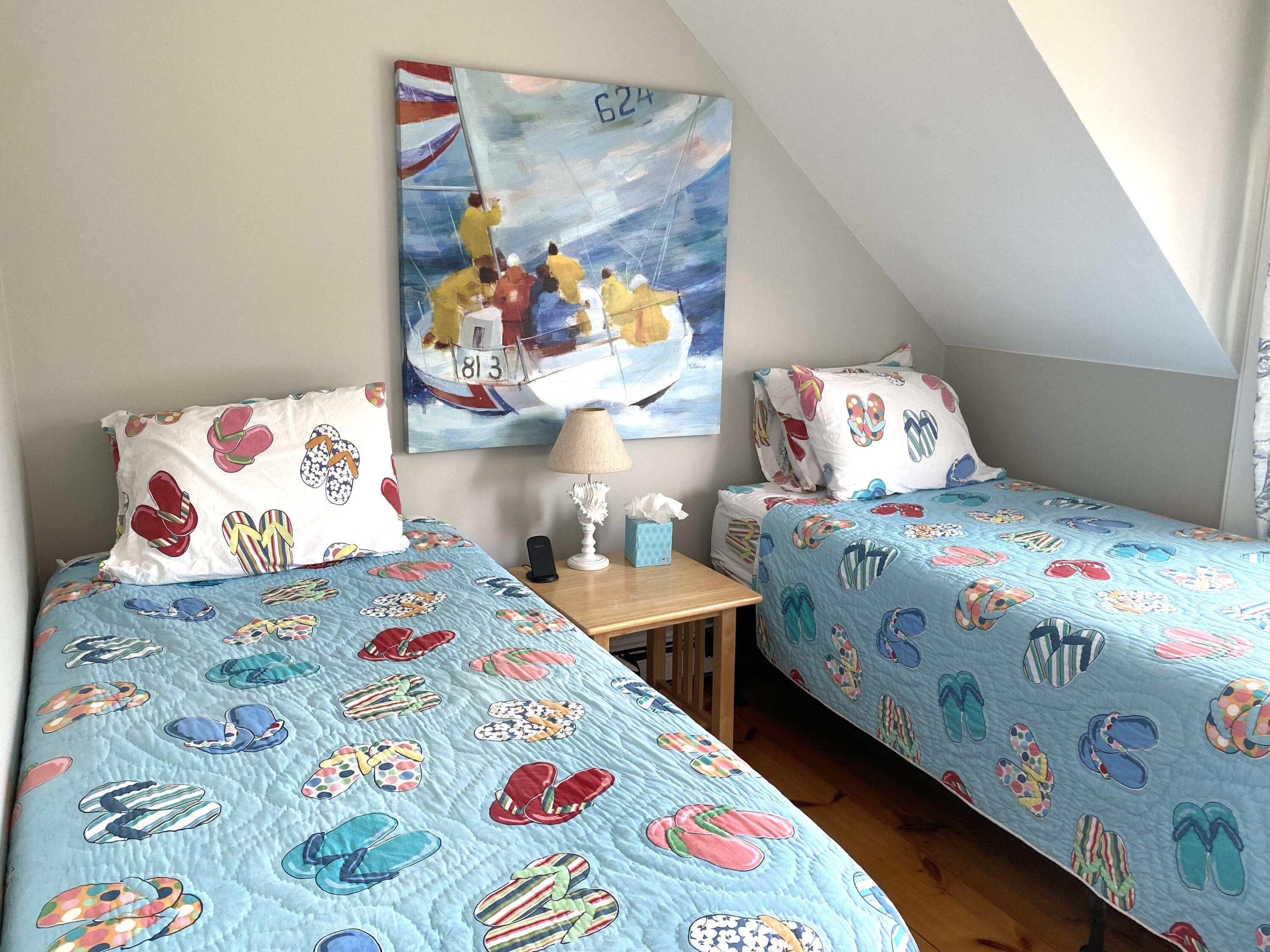 4 Race Point Road Mashpee, MA 02649 - Photo 32 of 37 a bedroom with bed and wooden floor