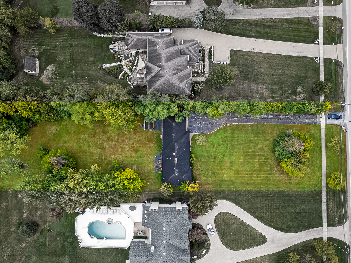 219 79th Street Burr Ridge, IL 60527 - Photo 24 of 28 a bird view of a garden with an outdoor space
