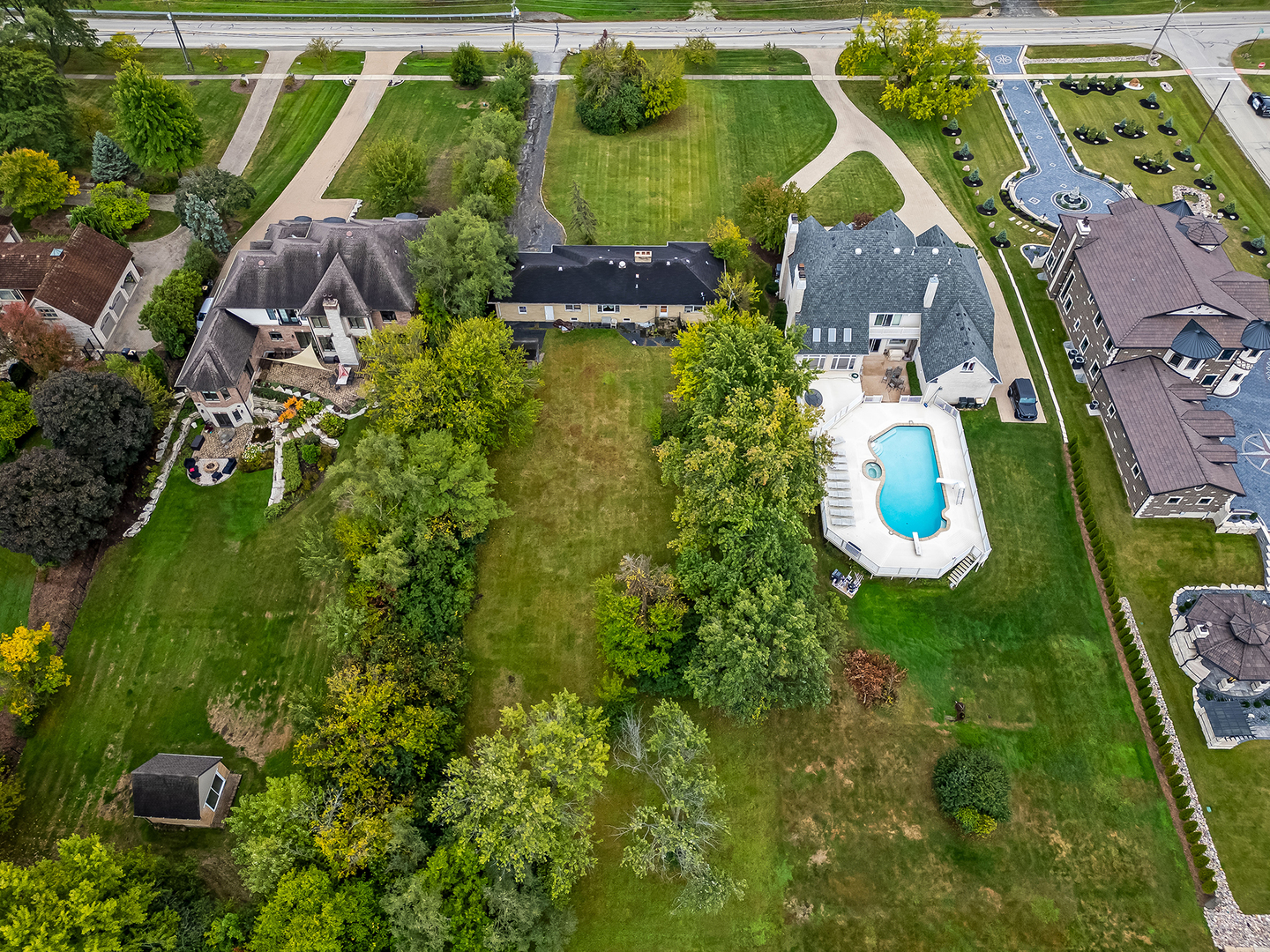 219 79th Street Burr Ridge, IL 60527 - Photo 25 of 28 an aerial view of houses with yard