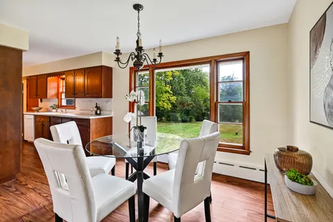 a kitchen with a sink a stove and a refrigerator