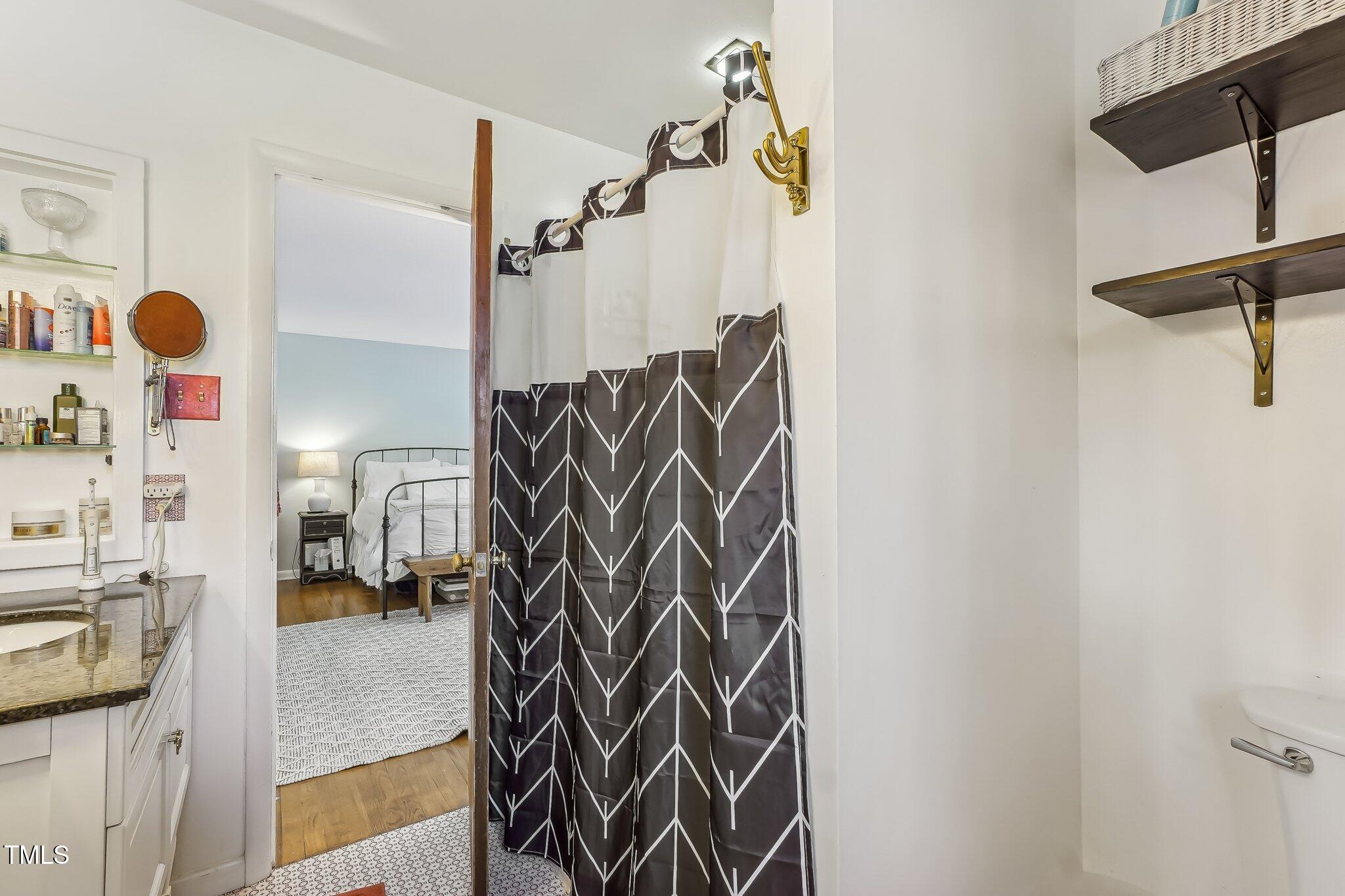 5410 Thayer Drive Raleigh, NC 27612 - Photo 18 of 36 a view of walk in closet